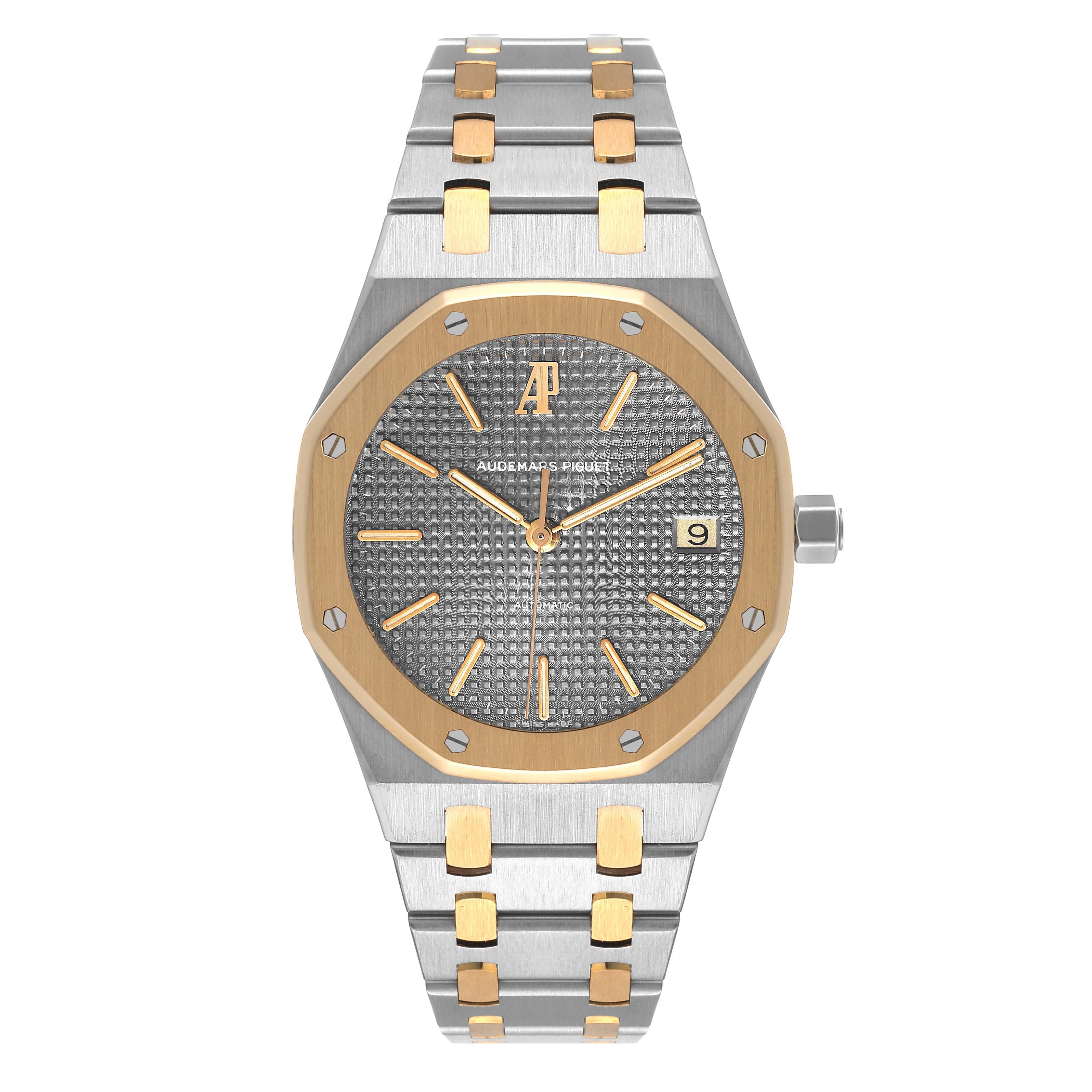 Audemars Piguet Royal Oak Steel Yellow Gold Mens Watch 14790SA. Automatic self-winding movement. Stainless steel and 18K yellow gold case 36.0 mm in diameter. 18K yellow gold bezel punctuated with 8 signature screws. Scratch resistant sapphire
