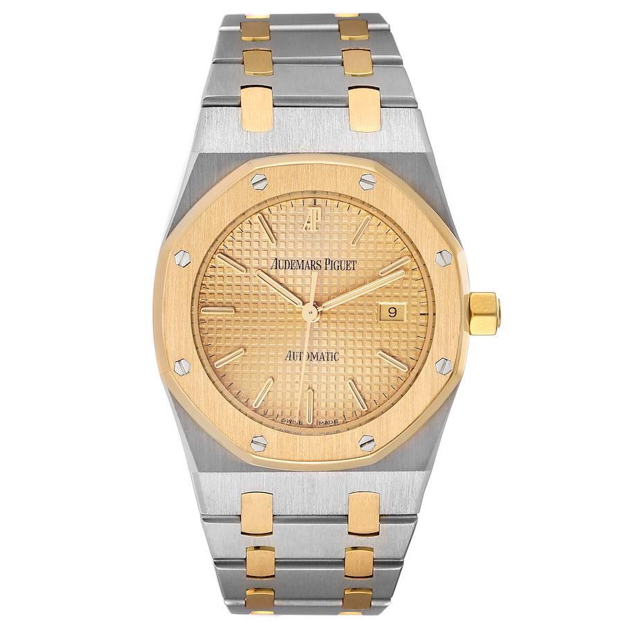 Audemars Piguet Royal Oak Steel Yellow Gold Mens Watch 15000SA. Automatic self-winding movement. Stainless steel case 33.0 mm in diameter. 18k yellow gold bezel punctuated with 8 signature screws. Scratch resistant sapphire crystal. Gold Tapisserie