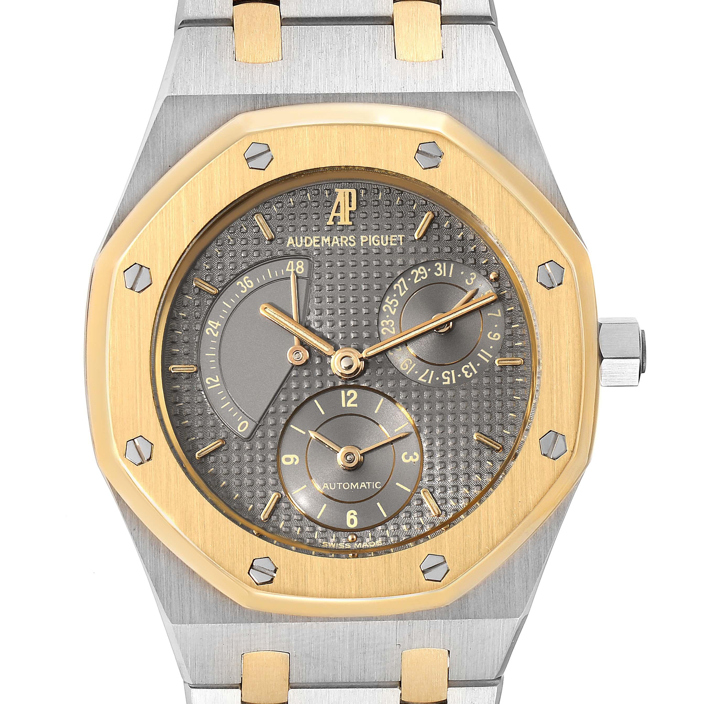 Audemars Piguet Royal Oak Steel Yellow Gold Mens Watch 25730 Service papers. Automatic self-winding movement. Brushed stainless steel and 18K yellow gold case 36.0 mm in diameter. 18K yellow gold bezel punctuated with 8 signature screws. Scratch