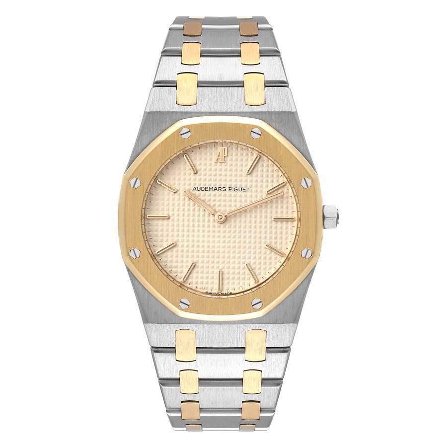 Audemars Piguet Royal Oak Stahl Gelbgold Herrenuhr 56303SA. Quarzwerk. Gehäuse aus Edelstahl mit einem Durchmesser von 33,0 mm. Lünette aus 18 Karat Gelbgold mit 8 Signaturschrauben. Kratzfestes Saphirglas. Cremefarbenes Tapisserie-Zifferblatt