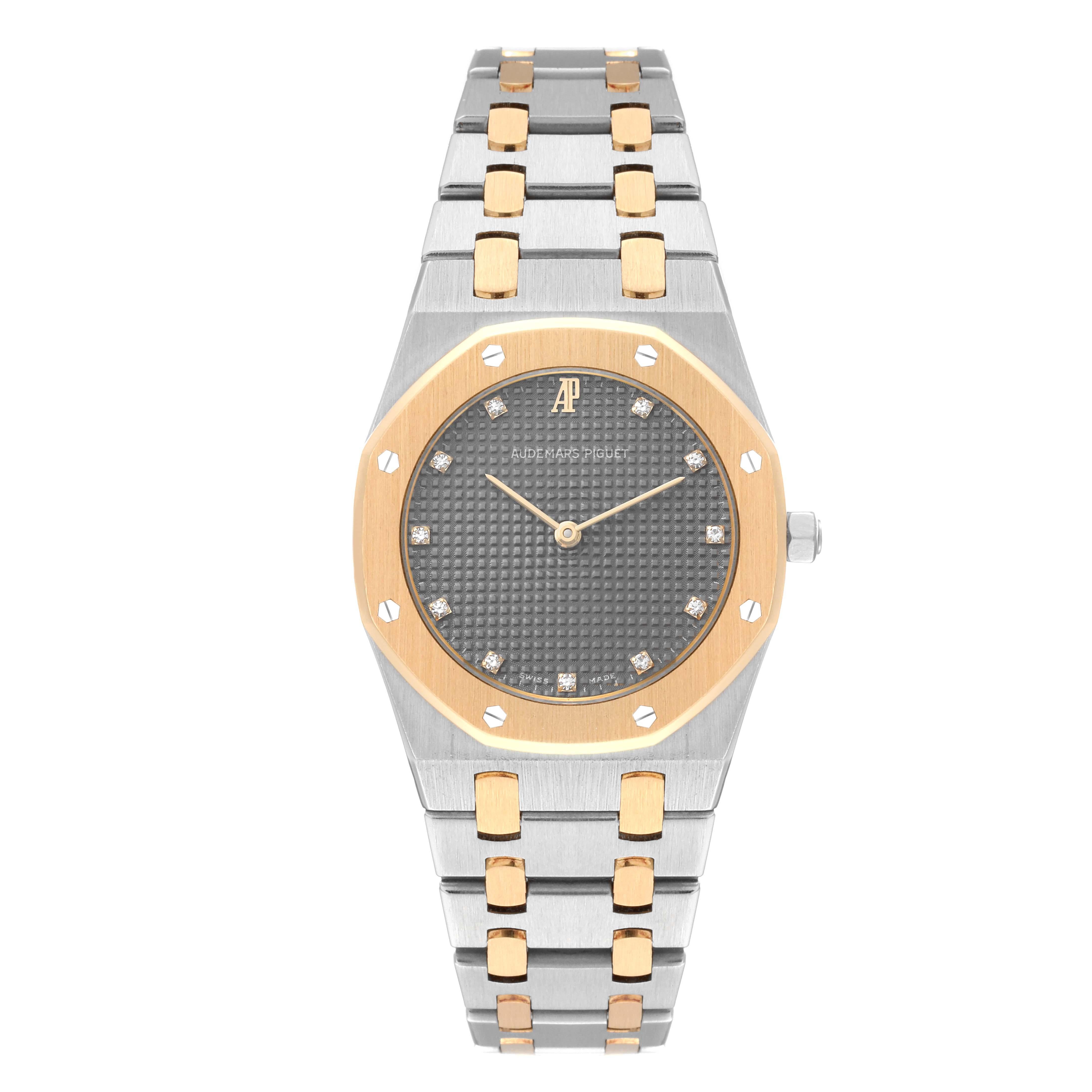 Audemars Piguet Royal Oak Steel Yellow Gold Mens Watch 56303SA. Quartz movement. Stainless steel case 33.0 mm in diameter. 18k yellow gold bezel punctuated with 8 signature screws. Scratch resistant sapphire crystal. Grey Tapisserie waffle pattern