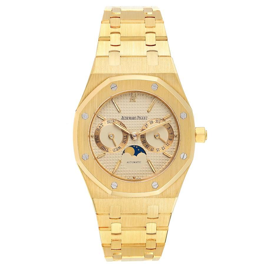 Audemars Piguet Royal Oak Yellow Gold Day Date Moonphase Mens Watch 25594. Automatic self-winding movement. 18K yellow gold case 36.0 mm in diameter. 18K yellow gold bezel punctuated with 8 signature screws. Scratch resistant sapphire crystal.