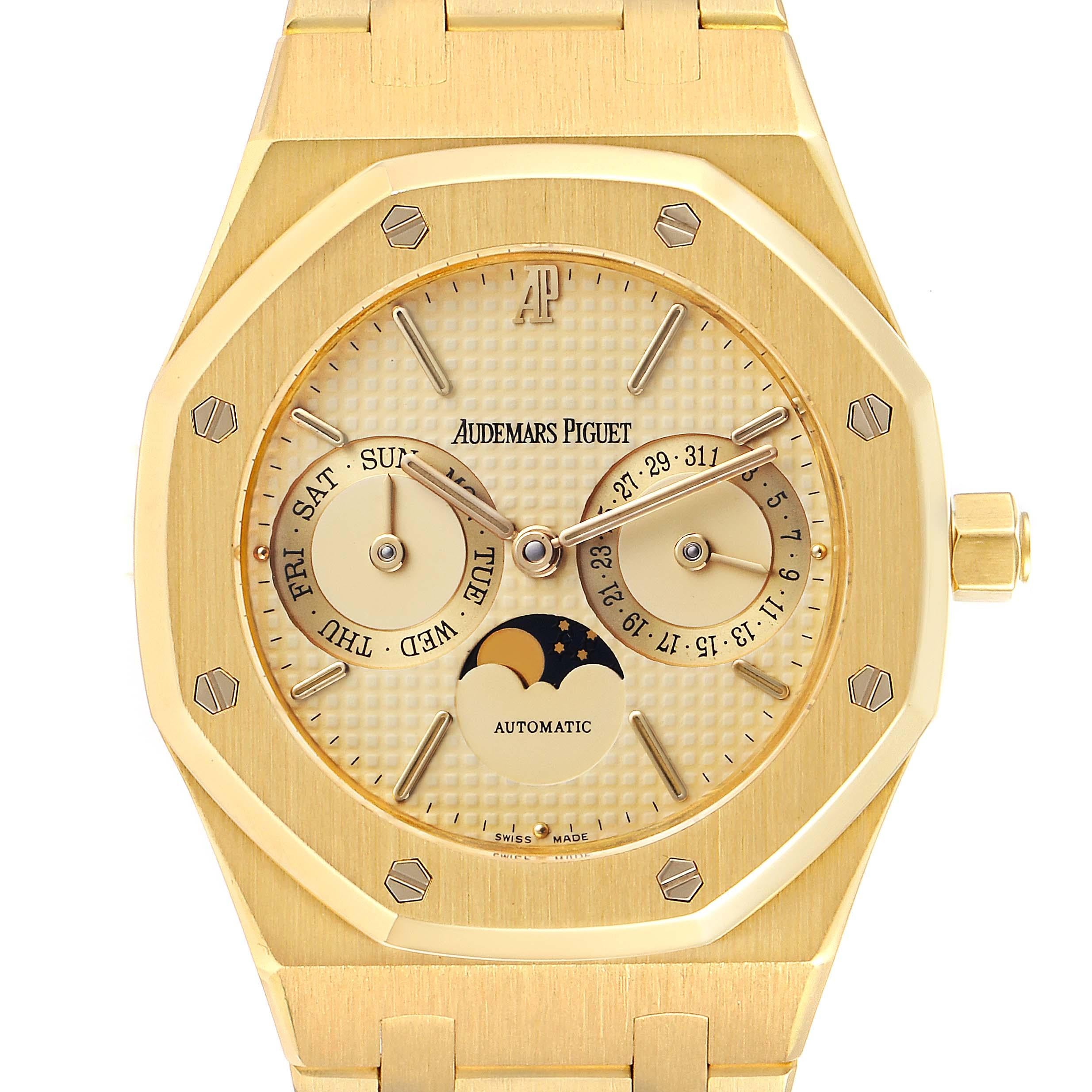 Audemars Piguet Royal Oak Yellow Gold Day Date Moonphase Mens Watch 25594. Automatic self-winding movement. 18K yellow gold case 36.0 mm in diameter. 18K yellow gold bezel punctuated with 8 signature screws. Scratch resistant sapphire crystal.
