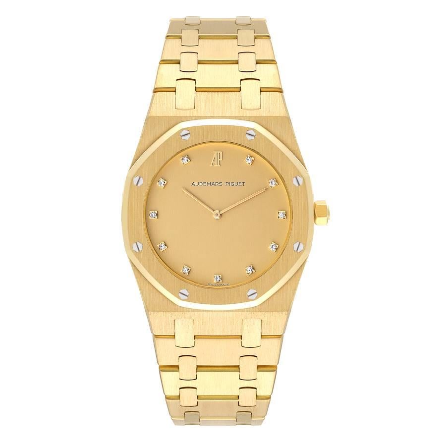Audemars Piguet Royal Oak Yellow Gold Diamond Dial Mens Watch. Quartz movement. 18k yellow gold case 33.0 mm in diameter. 18k yellow gold bezel punctuated with 8 signature screws. Scratch resistant sapphire crystal. Champagne dial with original