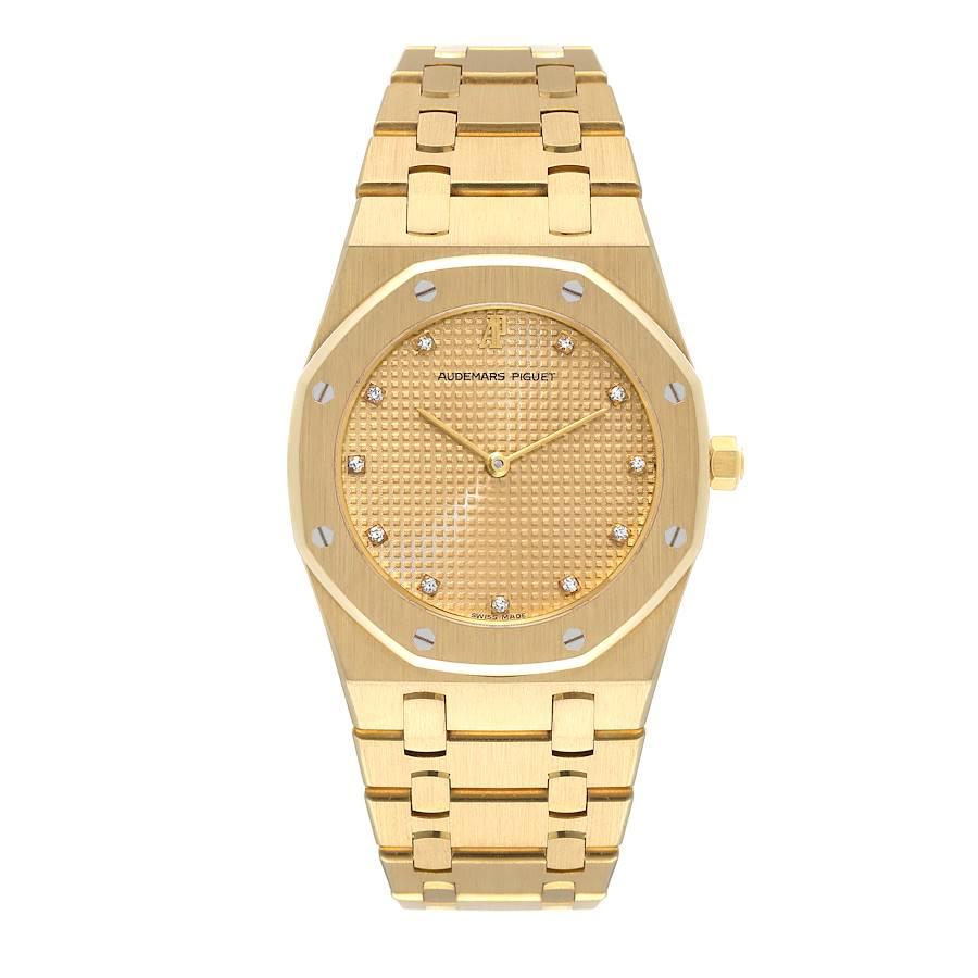 Audemars Piguet Royal Oak Yellow Gold Diamond Mens Watch 56303. Quartz movement. 18k yellow gold case 33.0 mm in diameter. 18k yellow gold bezel punctuated with 8 signature screws. Scratch resistant sapphire crystal. Champagne Tapisserie (waffle