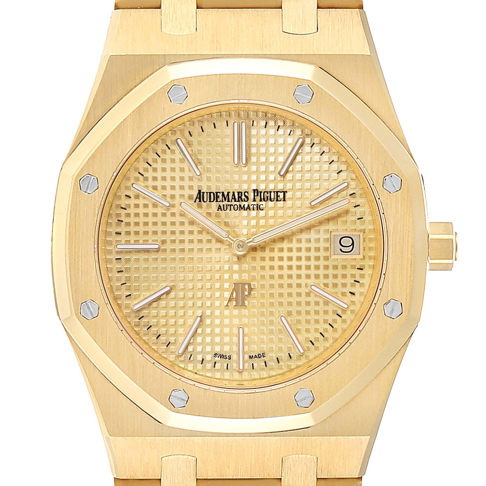 Audemars Piguet Royal Oak Yellow Gold Mens Watch 15202BA Box Papers. Automatic self-winding movement. 18K yellow gold hexagonal case 39 mm in diameter. Exhibition sapphire crystal case back. 18K yellow gold bezel punctuated with 8 signature screws.