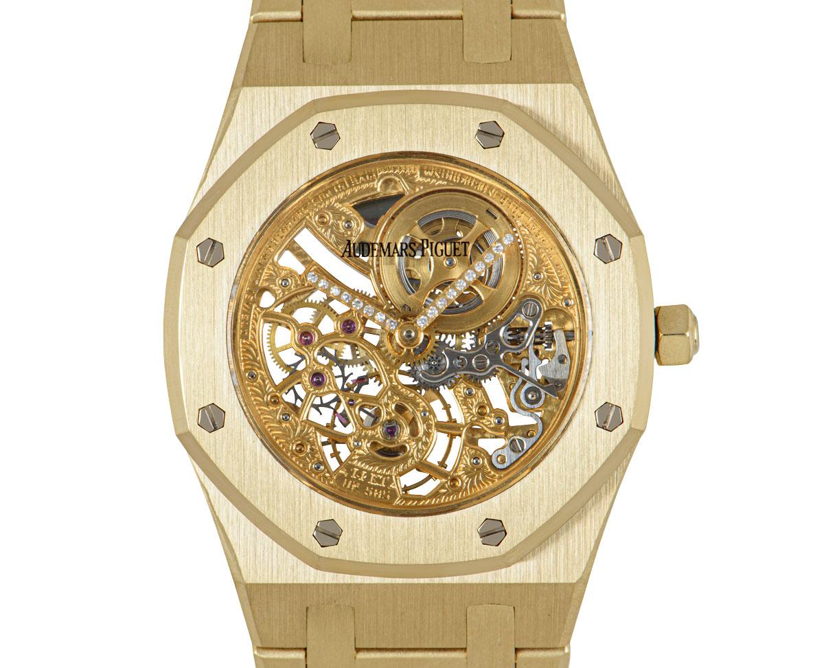 A very rare 31mm 18k yellow gold mid-size wristwatch, from the Royal Oak collection.

Features a champagne skeleton dial with diamond set hands, a fixed yellow gold bezel with 8 iconic Audemars Piguet screws, 18k gold bracelet with a concealed gold