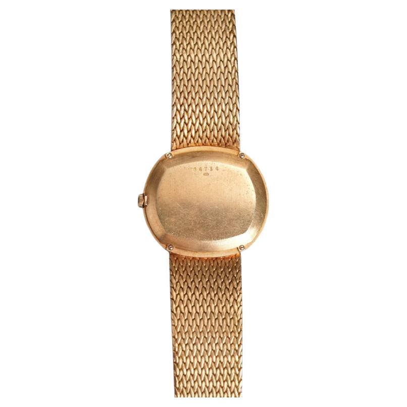 Aquí tienes un Audemars Piguet vintage con esfera de ojo de tigre de fábrica de cuerda manual en oro amarillo de 18 quilates de la década de 1970. Mantiene la hora y es totalmente funcional. Las medidas incluyen un tamaño de caja tonneau de 30 mm de