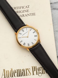 Audemars Piguet Ultra Thin 18k gold Quartz White Roman spider dial 31mm