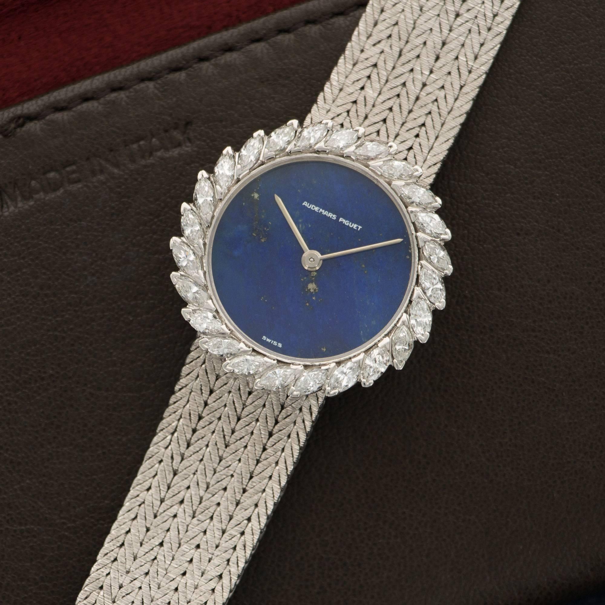 An 18k White Gold Audemars Piguet Watch with Lapis Lazuli Dial. Beautiful & Original Marquise-Shape Diamond Bezel. Case Diameter is 28mm. Bracelet is 170mm. 