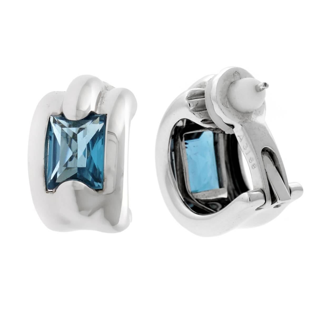 A chic pair of Audemars Piguet earrings featuring blue topaz set in 18k white gold.

Length: .74