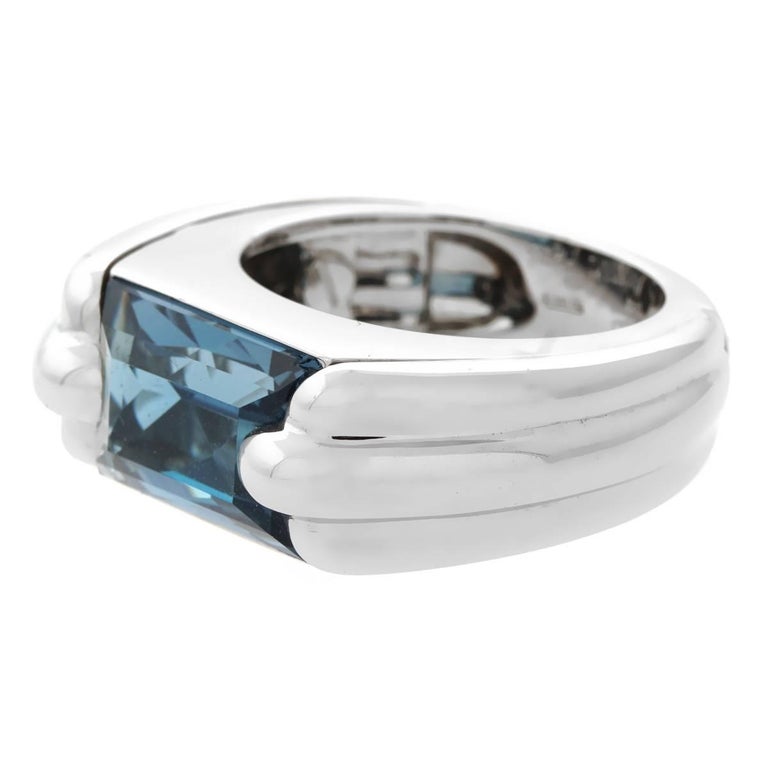 A chic Audemars Piguet ring featuring a blue topaz set in 18k white gold. Size 5.75

Sku: 876