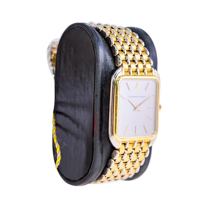FACTORY / HOUSE: Audermars Piguet Watch Company
STYLE / REFERENCE: Integrated Gold Bracelet / Dress Style
METAL / MATERIAL:  Two Tone 18k Yellow and White Gold
DIMENSIONS: Length 33mm X Width 26mm
CIRCA: 1980's
MOVEMENT / CALIBER: Manual Winding /