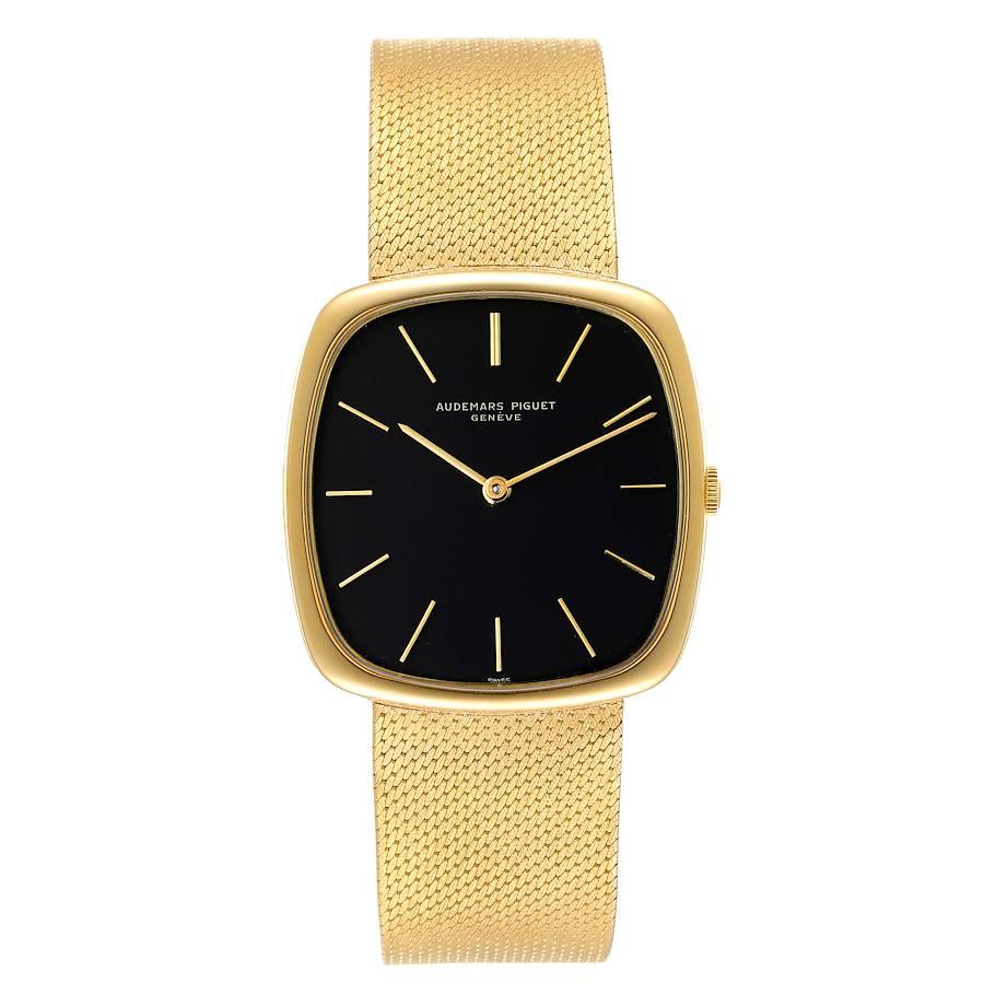 Audemars Piguet Yellow Gold Black Dial Vintage Mens Watch. Manual winding movement. 18k yellow gold rectangular case 34.0 mm x 32.0 mm. 18k yellow gold smooth bezel. Scratch resistant sapphire crystal. Matte black dial with baton hands and hour