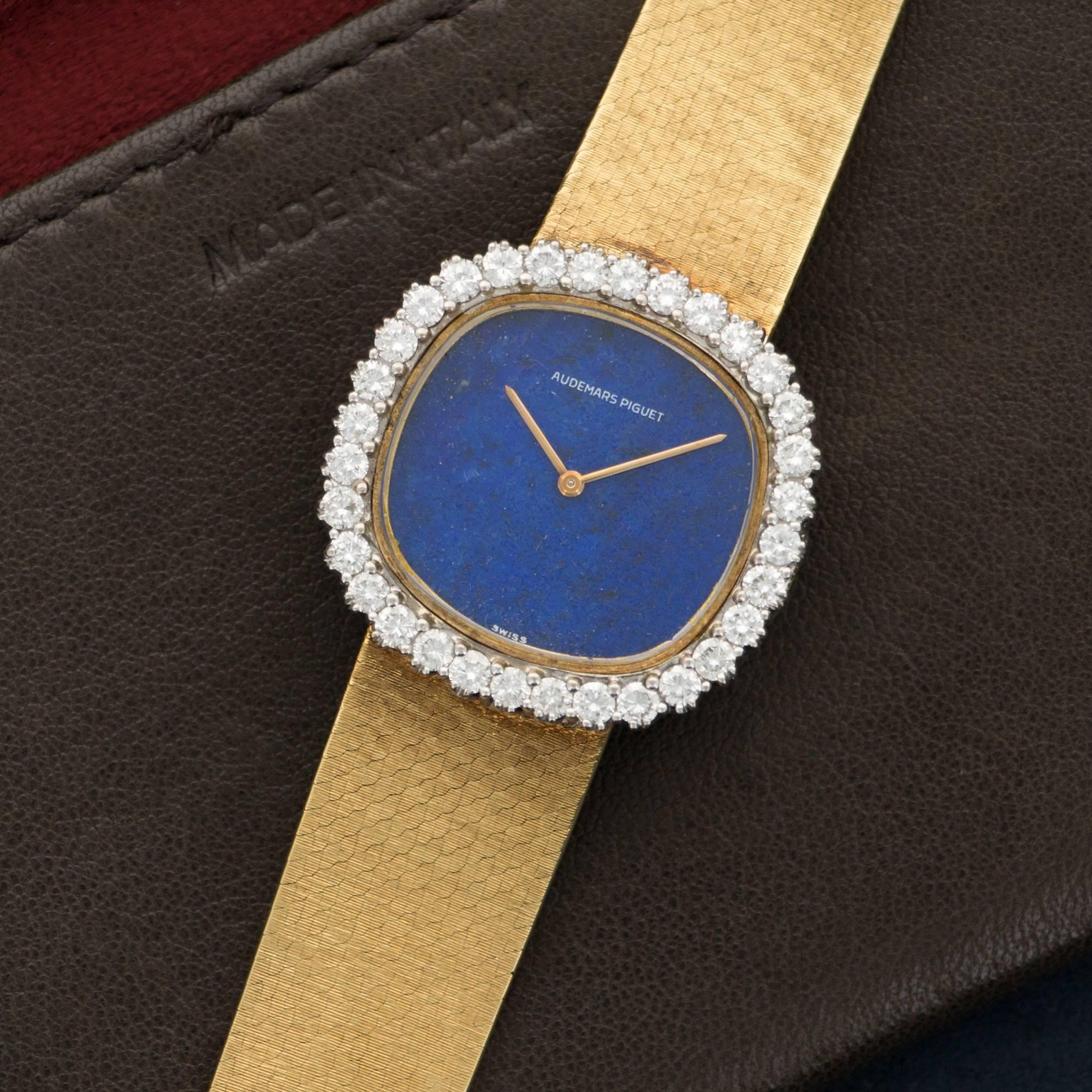 An 18k Yellow Gold Bracelet Watch with Lapis Lazuli Dial and Diamond Bezel, By Audemars Piguet. Circa 1970's. Case Measures 27mm. Mechanical Wind. Excellent Original Condition. 