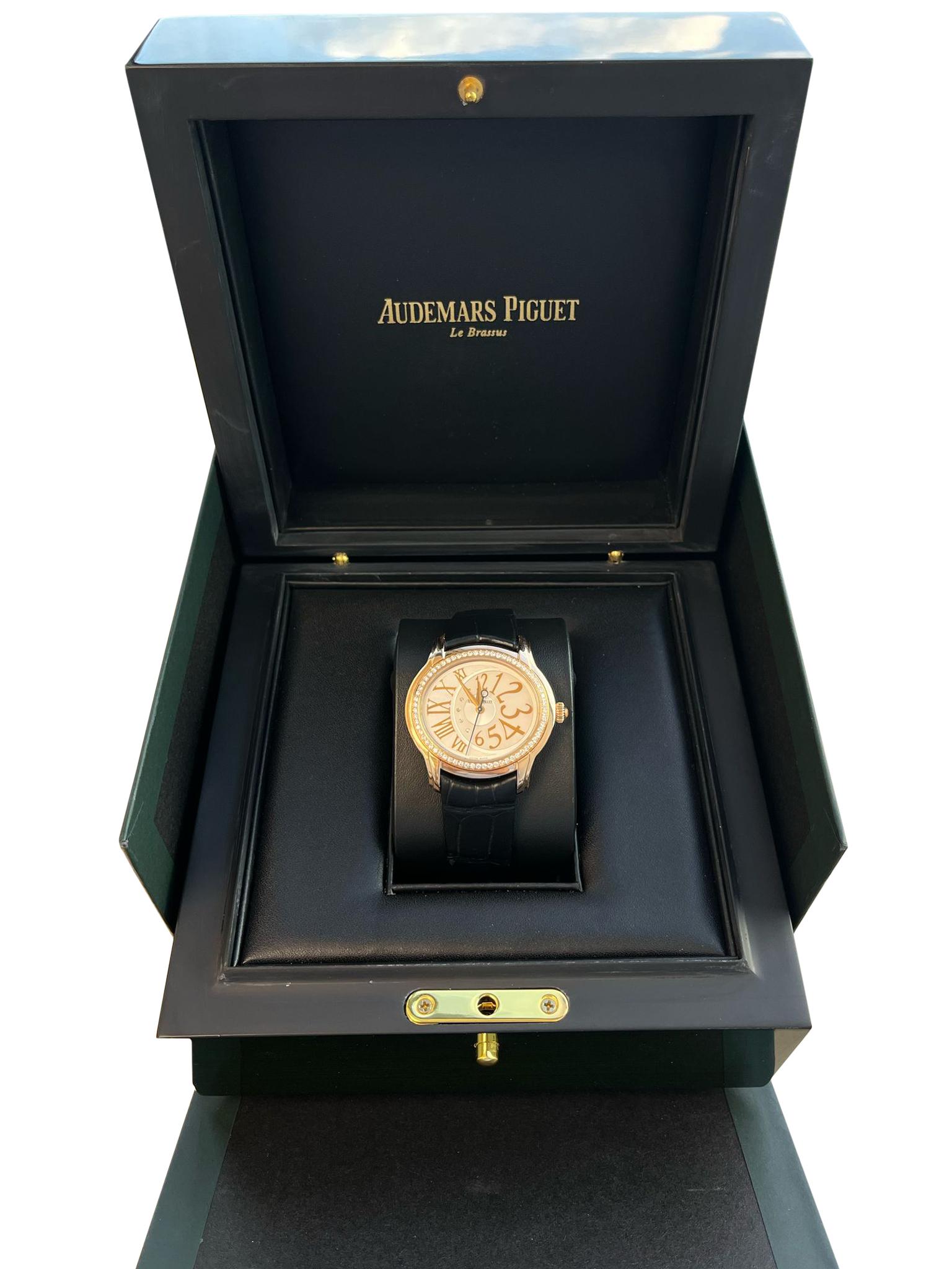 Audermars Piguet Ladies Millernary 18k Rose Gold 77301OR.ZZ.D015CR.01 Q5BZCR Case diameters are 39.5mm x 35.5mm x 8.1mm 18K pink gold case, stamped back with set with 66 diamonds (~0.62ct), white dial with off-center mother of pearl disc,
