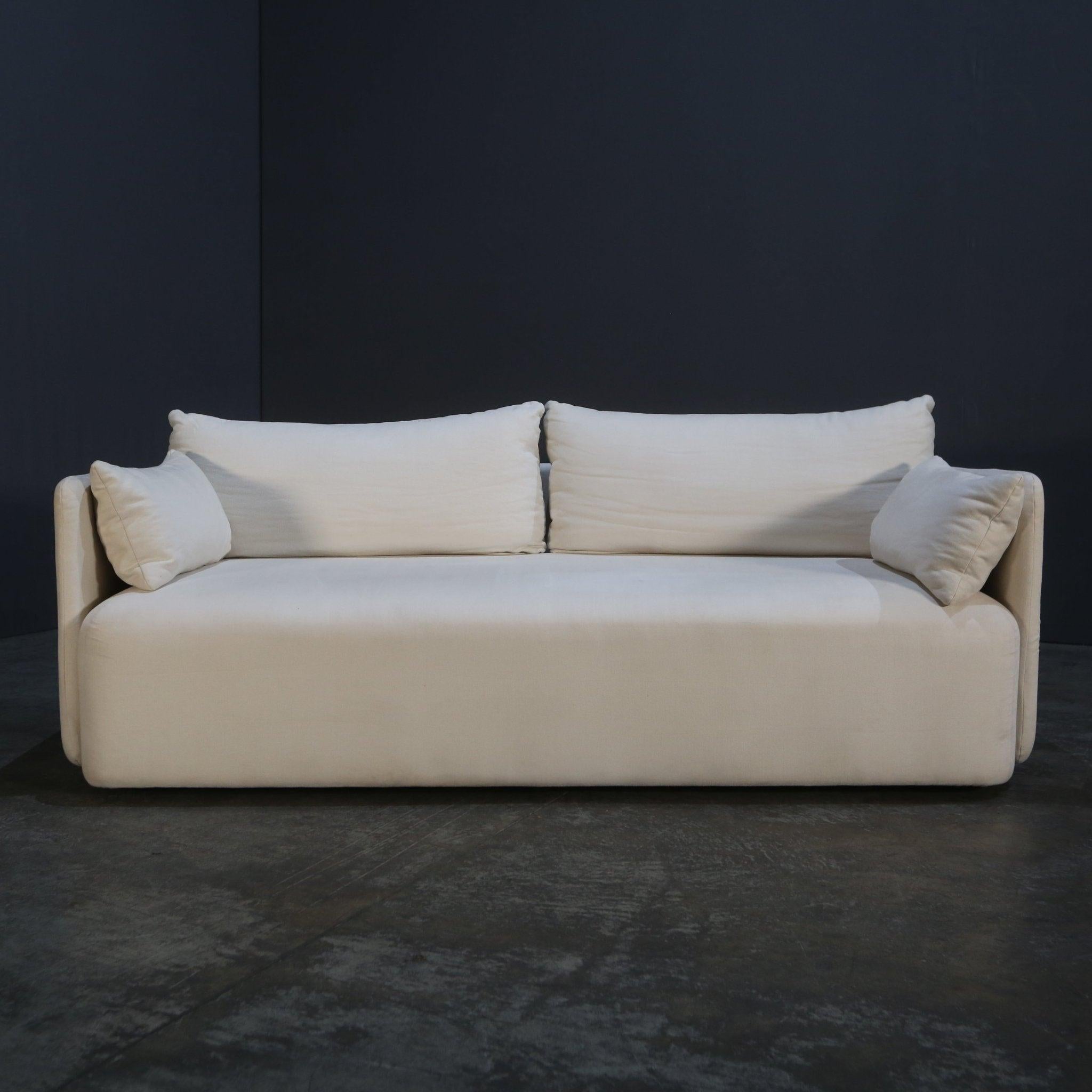 Introducing the Audo Copenhagen Menu Offset Sofa, a stunning addition to any modern living space. Crafted with the highest quality materials, this sofa boasts a sleek and contemporary design that is sure to impress. The plush cushions provide