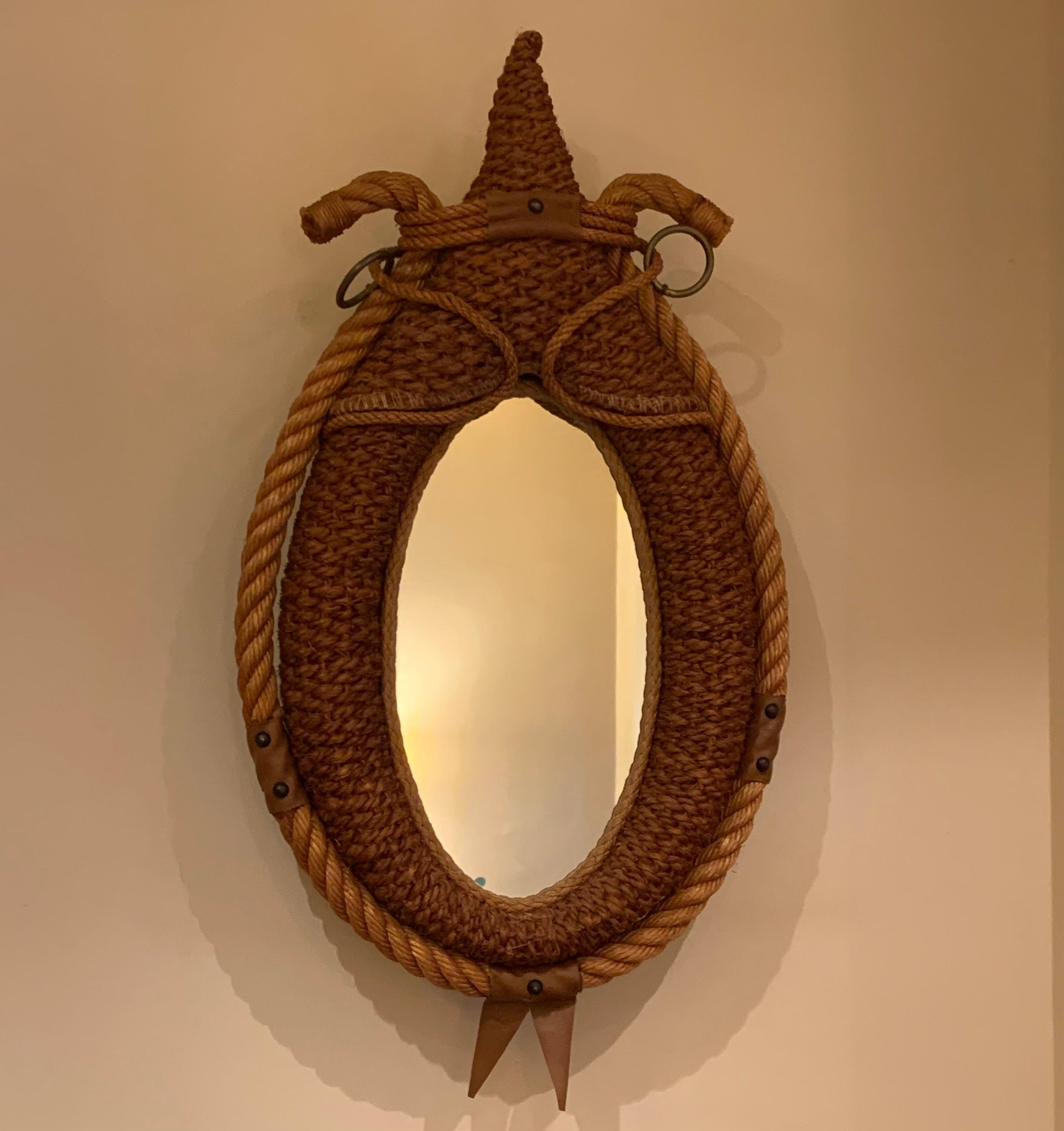 Manufactured by Atelier Audoux et Minet

France, 1960’s

Rope and brass details.

Measurements:

38 × 65 (H) cm , Depth 10 cm

Provenance:

Private collection, France

