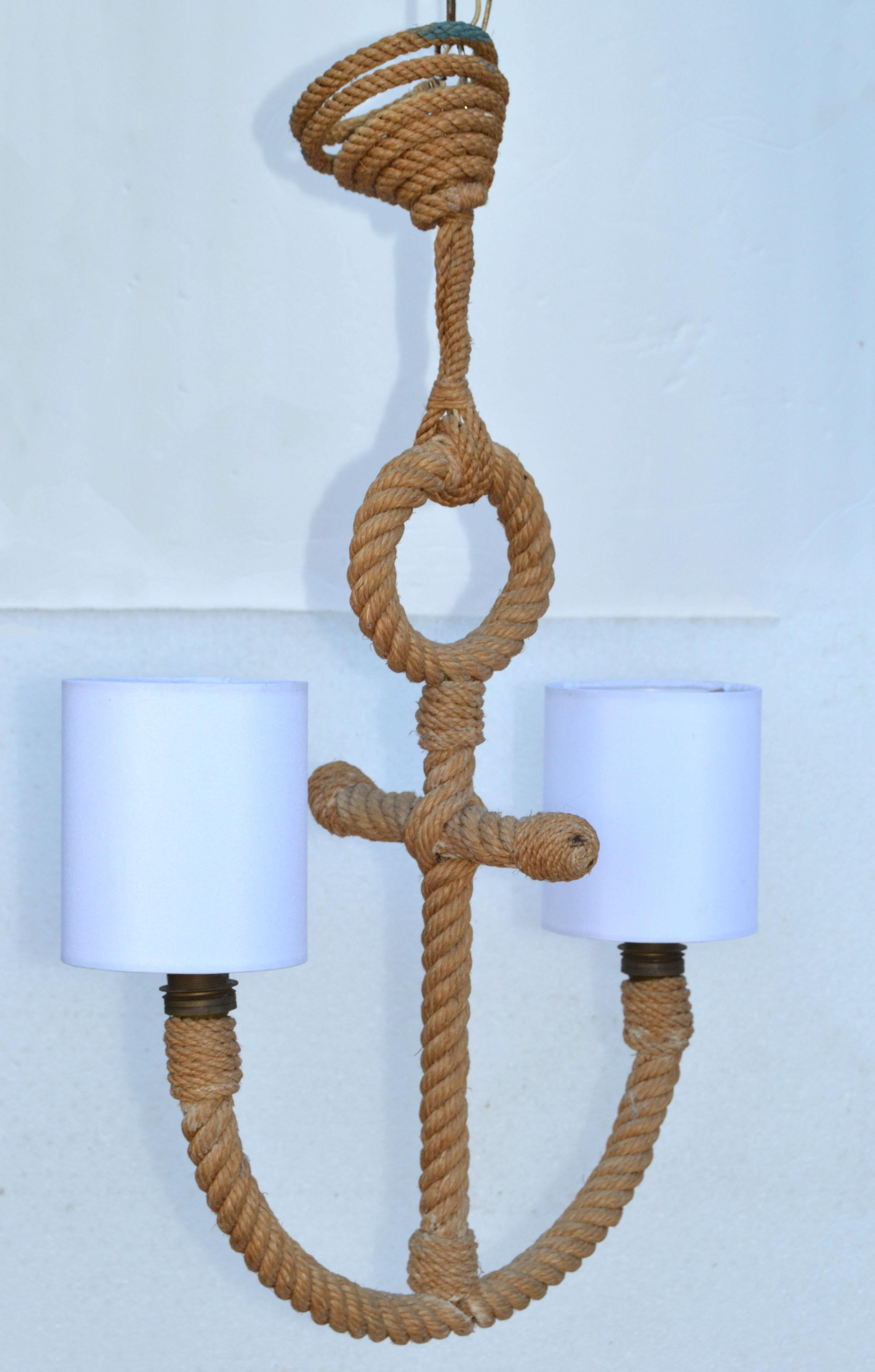 Audoux Minet 2-light French Rope chandelier in a classic Nautical Anchor Design.
Original wiring and takes 2 Torpedo E 14 Light Bulbs with max. 60 watts.
Comes with the white Clip on Shades.
Shades measure: 
Diameter: 4.5 inches x 4 inches