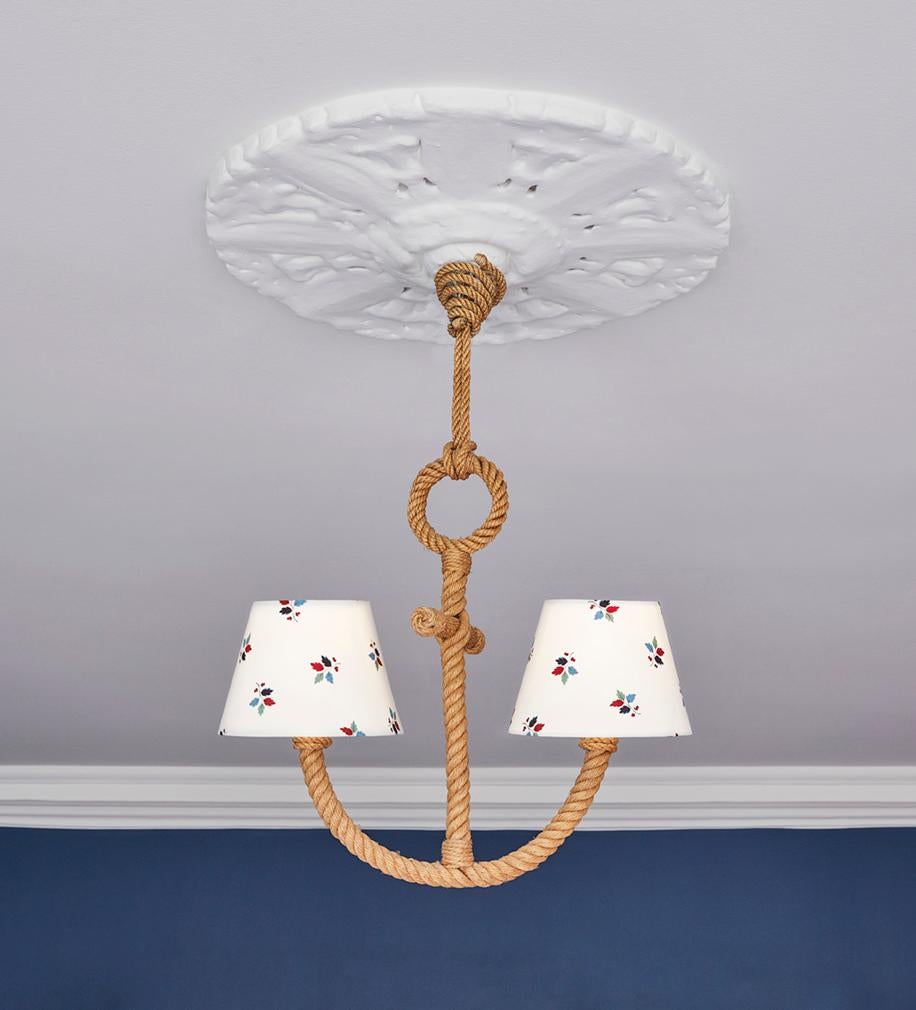 Rare Adrien Audoux and Frida Minet anchor-shaped rope chandelier with two leaf-patterned lampshades. 

Adrien Audoux' and Frida Minet's store, located along the French Riviera, brought the design-couple great recognition in the mid-20th century