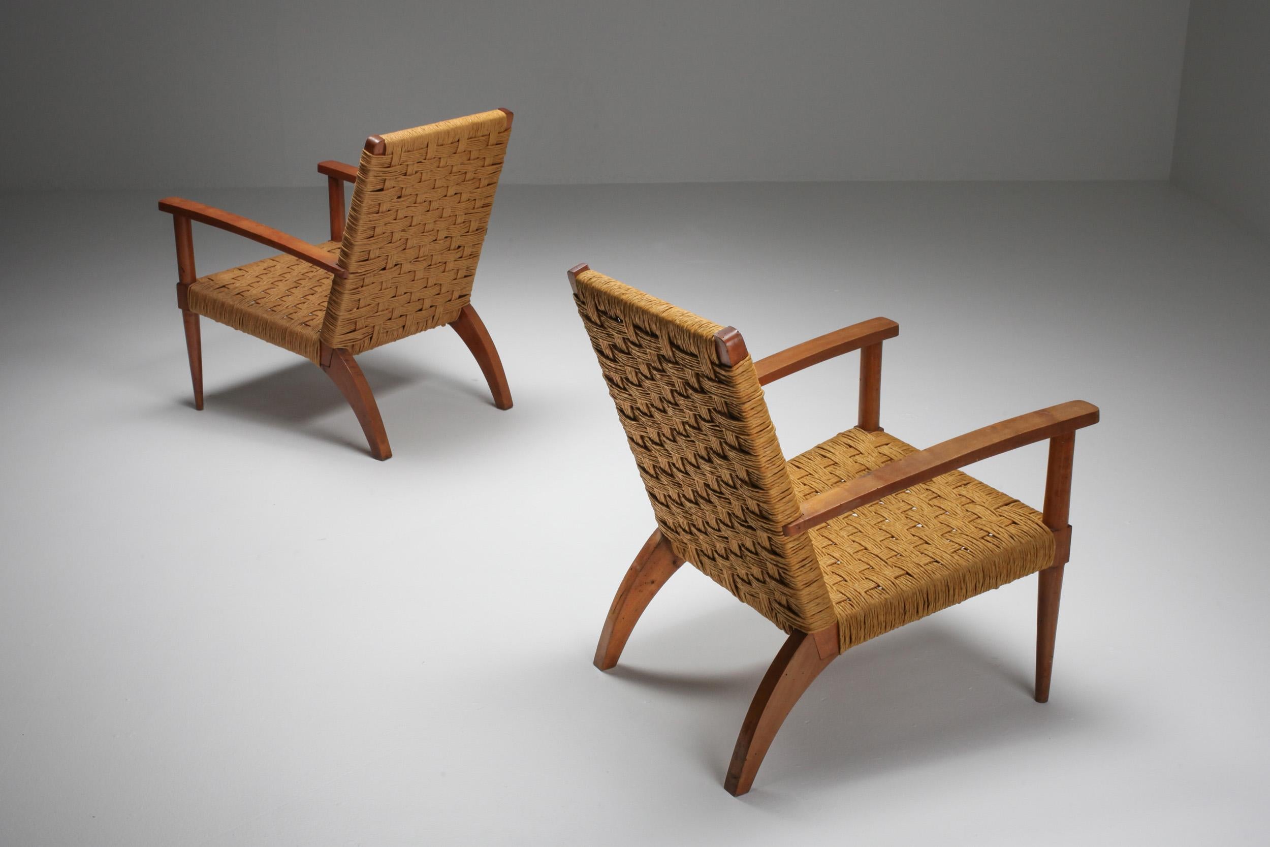 Beech and cord Mid-Century Modern pair of armchairs, Audoux Minet, France, 1960s

Rustic modern pair of French armchairs that would fit well in a naturalist wabi sabi decor.
  