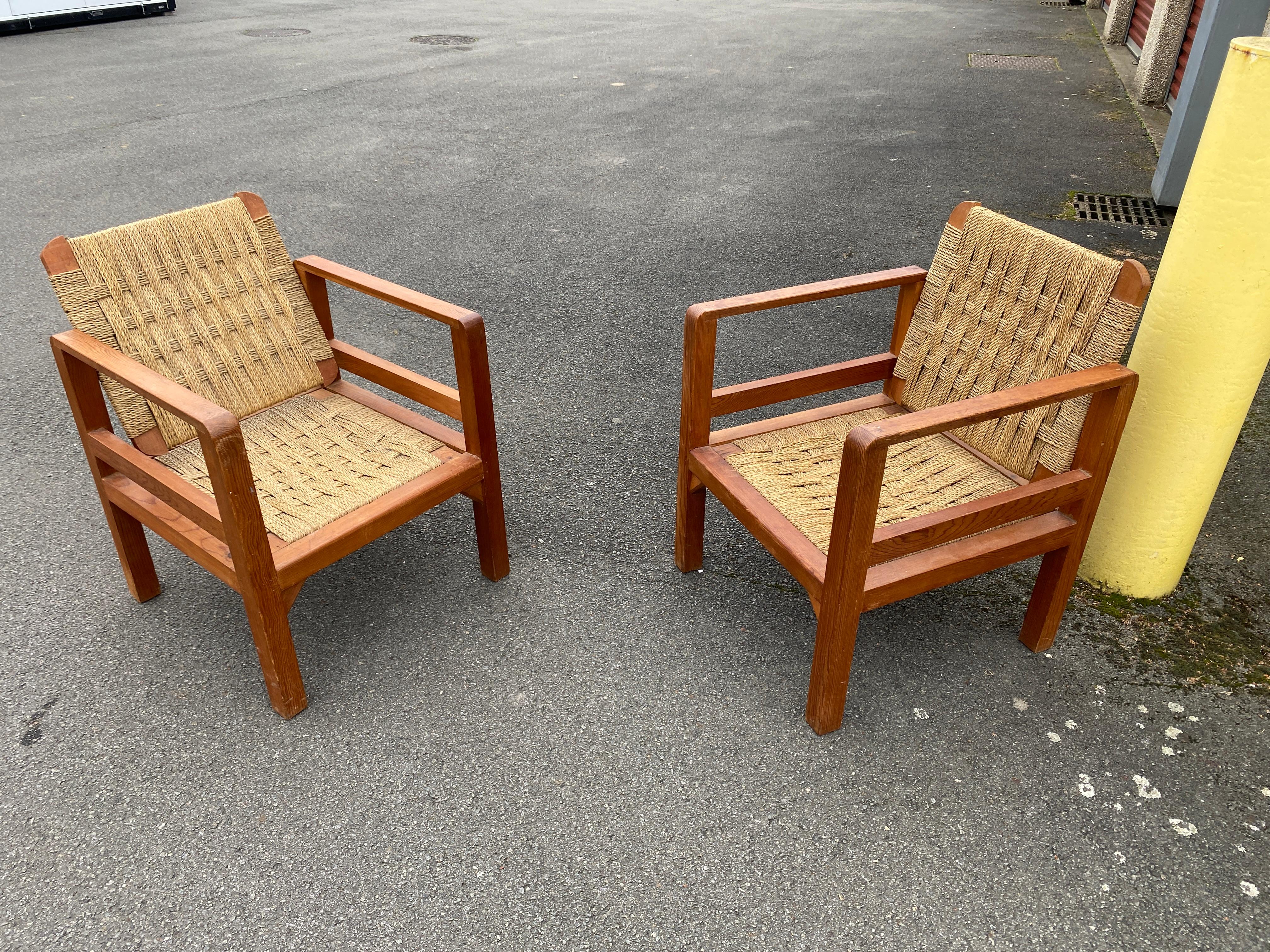 Audoux-Minet (attributed to )  3 armchairs  circa 1950

in pine and rope, the tilting backrest.
Beautiful patina, wood and rope in very good condition.
No restoration to be expected
