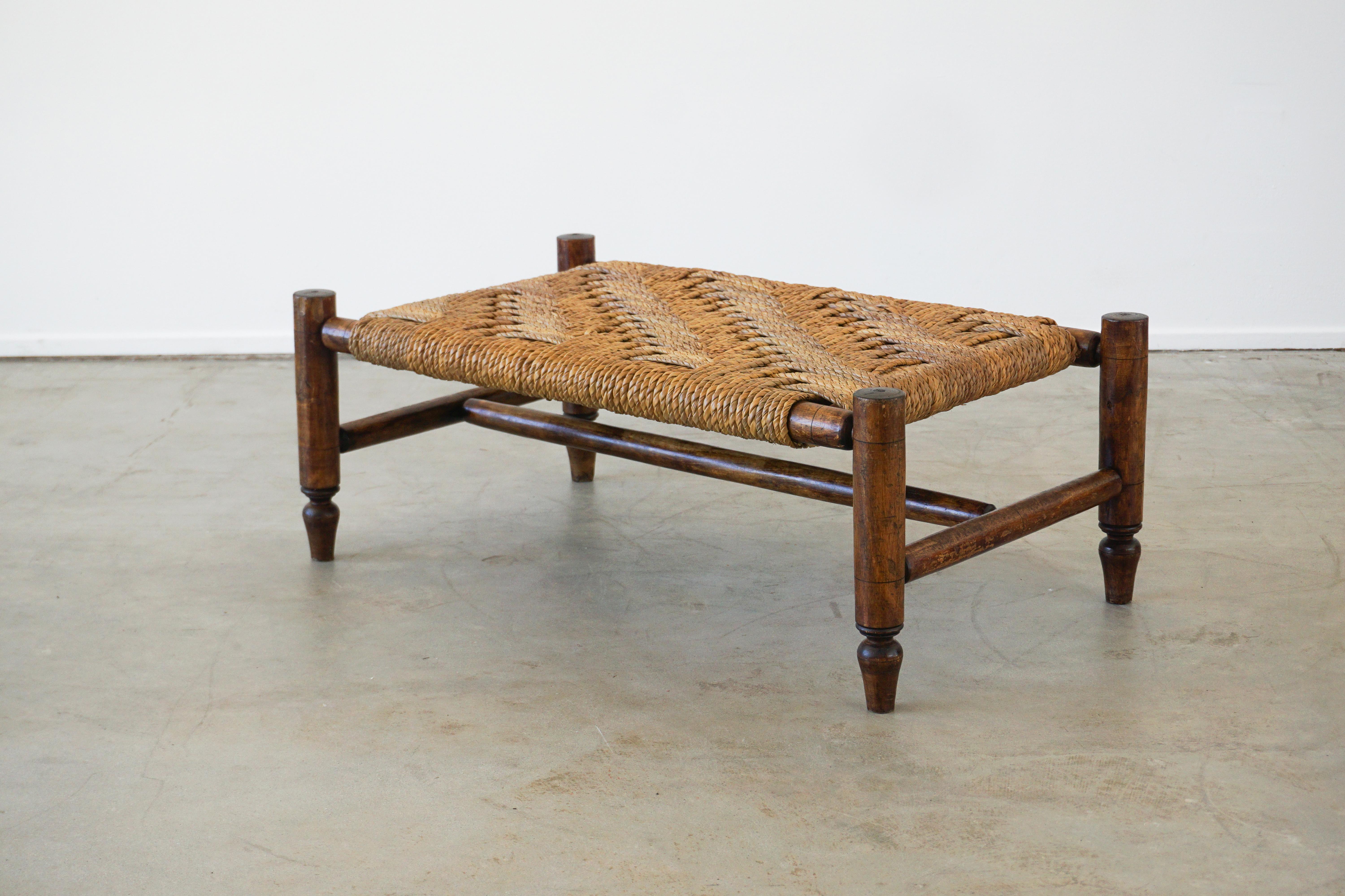 Audoux Minet coffee table with woven rope top
Could be used as a coffee table or ottoman table 
Great patina to oakwood and rope top. 
  
  