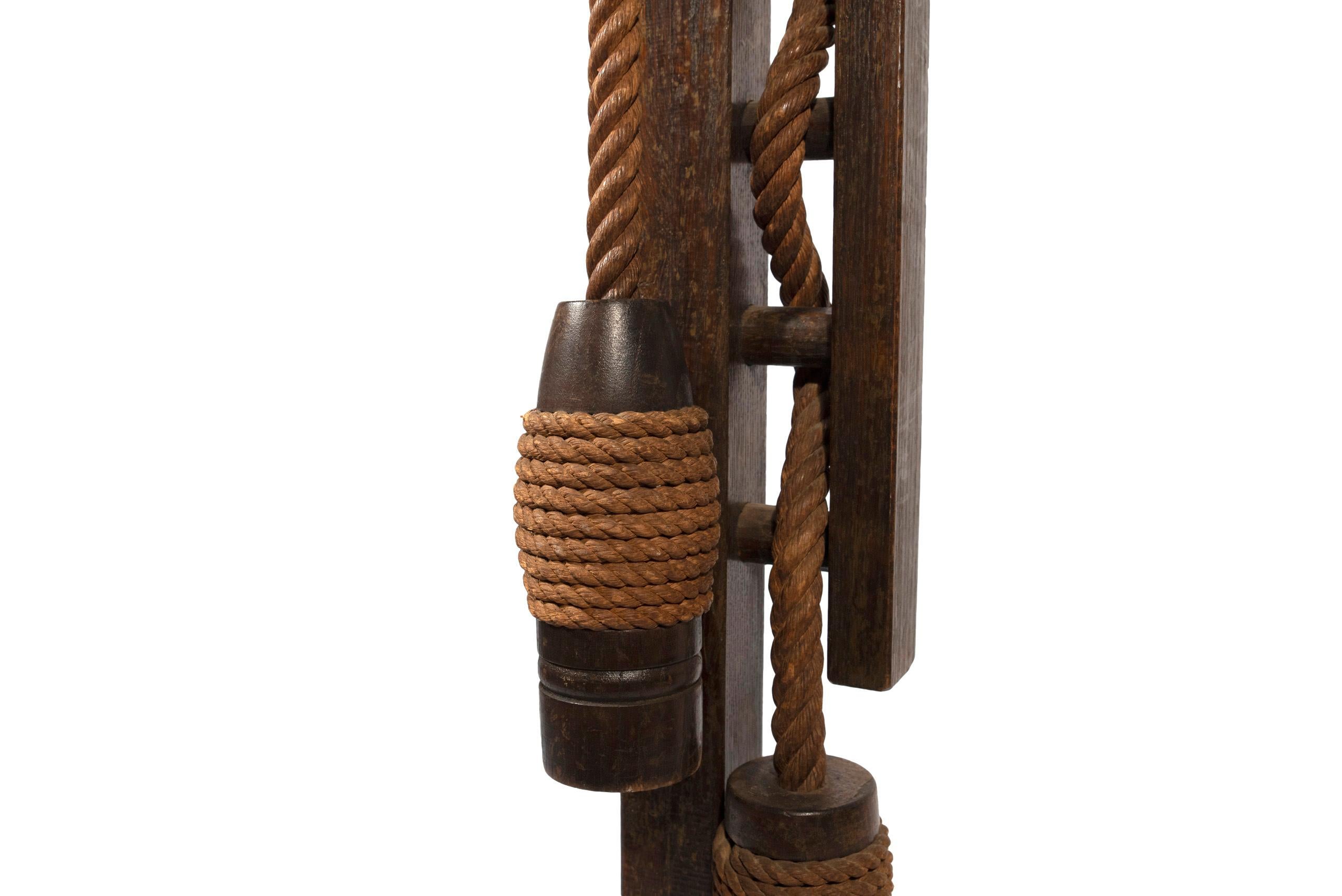 Audoux-Minet,
Floor lamp,
Wood and rope,
circa 1950, France.
Measures: Height 178 cm, diameter 28 cm.