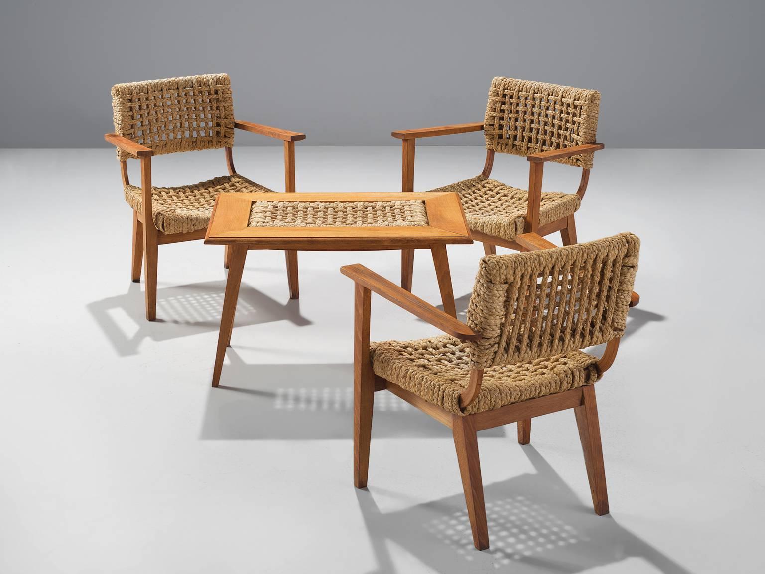 Audoux-Minet for Vibo, set of chairs and table, France, 1940s.

This robust French set originates from the late 1940s. The seat, back and in case of the table the top are made of woven hemp from the abaca plant which is close to the species of the