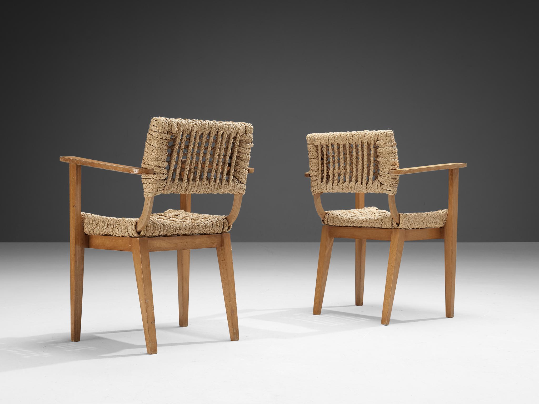 Adrien Audoux and Frida Minet for Vibo, pair of armchairs, beech, rope hemp, France, late 1940s.

Pair of naturalistic dining chairs designed by Adrien Audoux and Frida Minet. The seating and backrest are made of woven hemp from the abaca plant