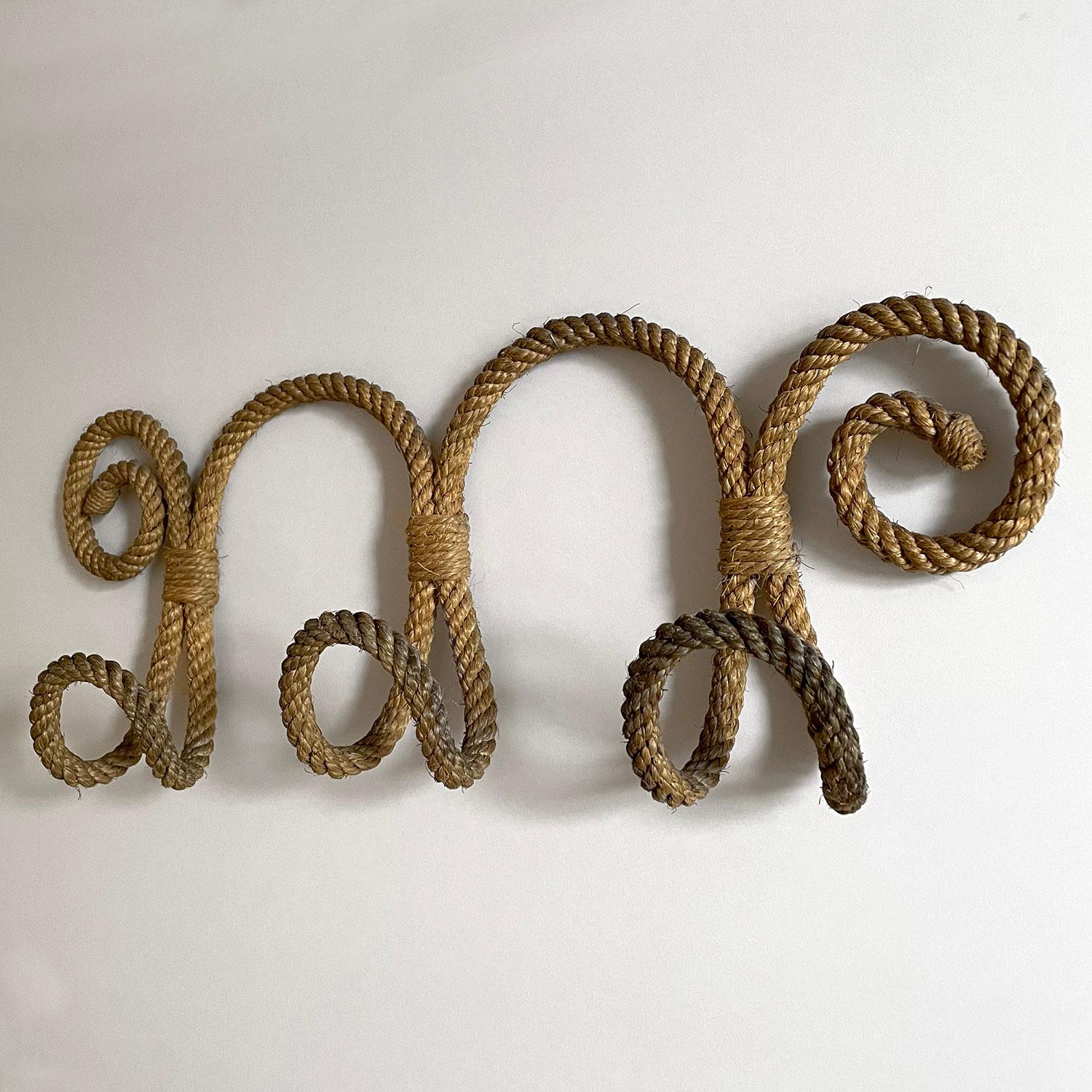 Adrien Audoux & Frida Minet rope coat rack 
France, circa 1950’s
Sculptural rope piece made up of three hooks, beautiful arches and coiled ends
Beautifully worn in from years of love and wear, ready for many more to come
Each hook has a blue hued