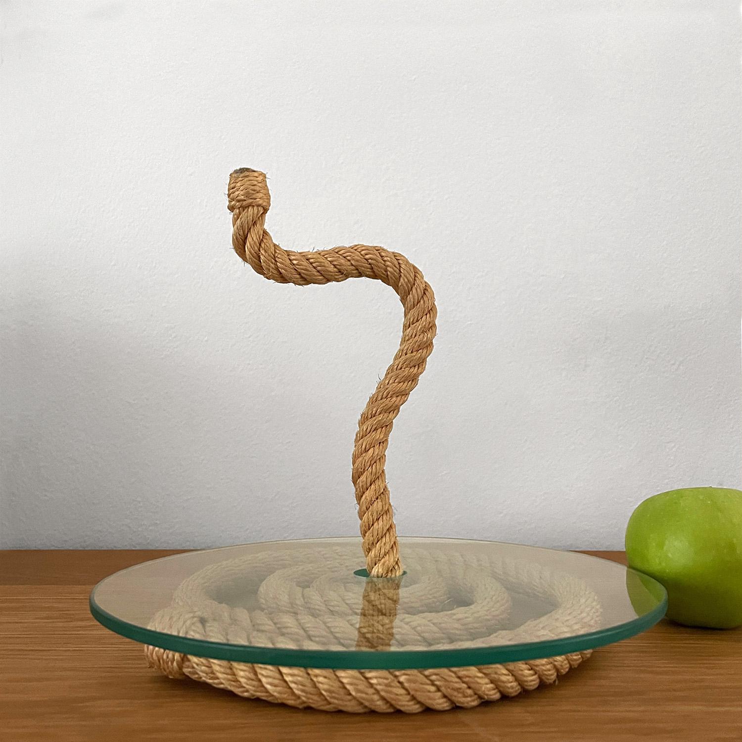 Audoux Minet rope and glass service plate 
France, circa 1950’s
Beautifully sculpted and coiled rope center piece has natural color variations 
Patina from age and use
New glass service plate
This listing is for a single plate
Last photo is for