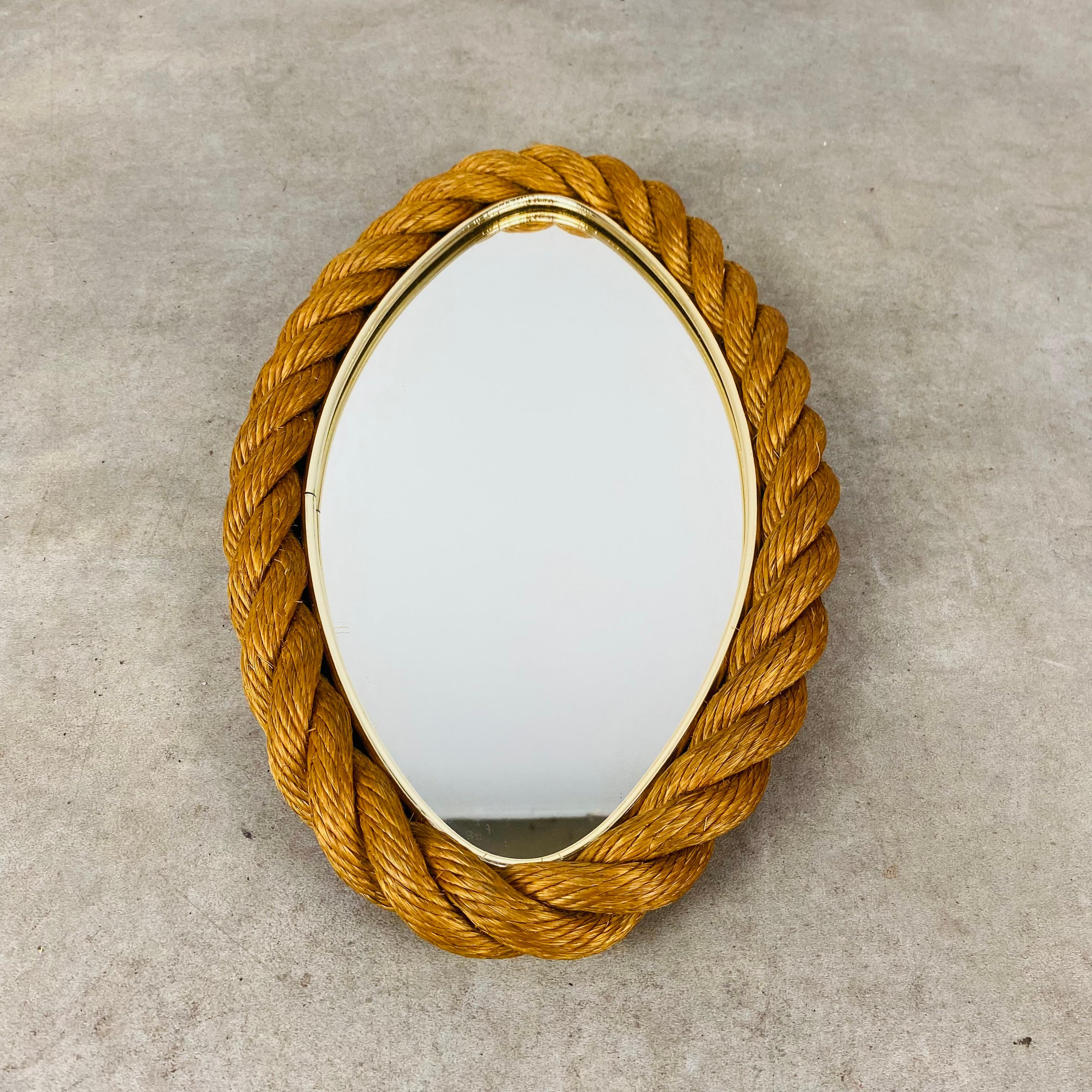 Oval rope mirror in the style of Adrien Audoux and Frida Minet. 