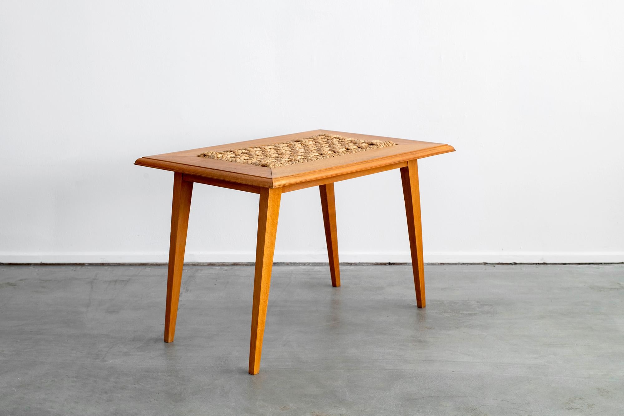 Wonderful Audoux Minet table with rope inlay and tapered legs.
  