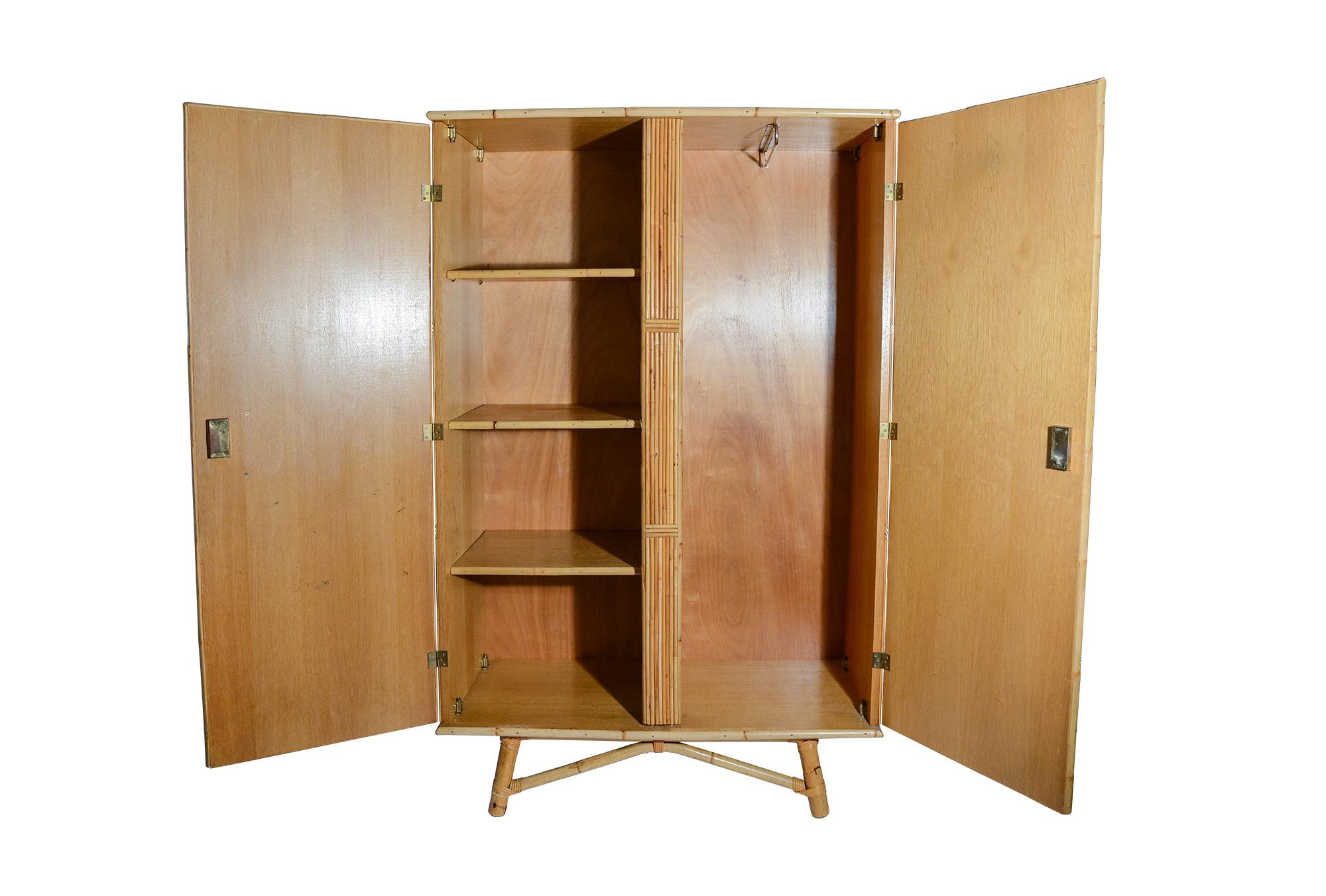 Armoires Audoux-Minet:: 
rotin et bois:: 
circa 1965:: France. 
Mesures : Hauteur 1m76:: largeur 110 cm:: profondeur 50 cm.