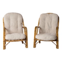 Audoux Minnet Rattan Armchairs with Off-White Bouclé Cushions, France, 1960s