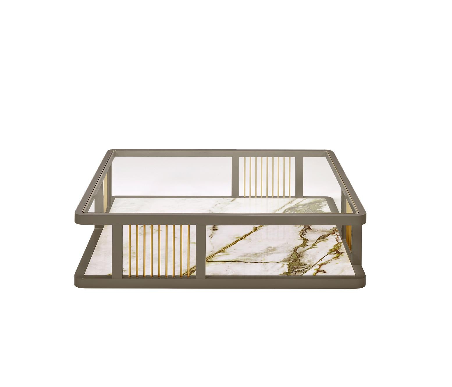 AUDREY coffee table: STOCK UNIT - Available for immediate delivery

AUDREY is a notable coffee table. The tempered glass top allows the look to the refined base in ceramic. The structure is graced by the metal details, in brass, keeping the balanced