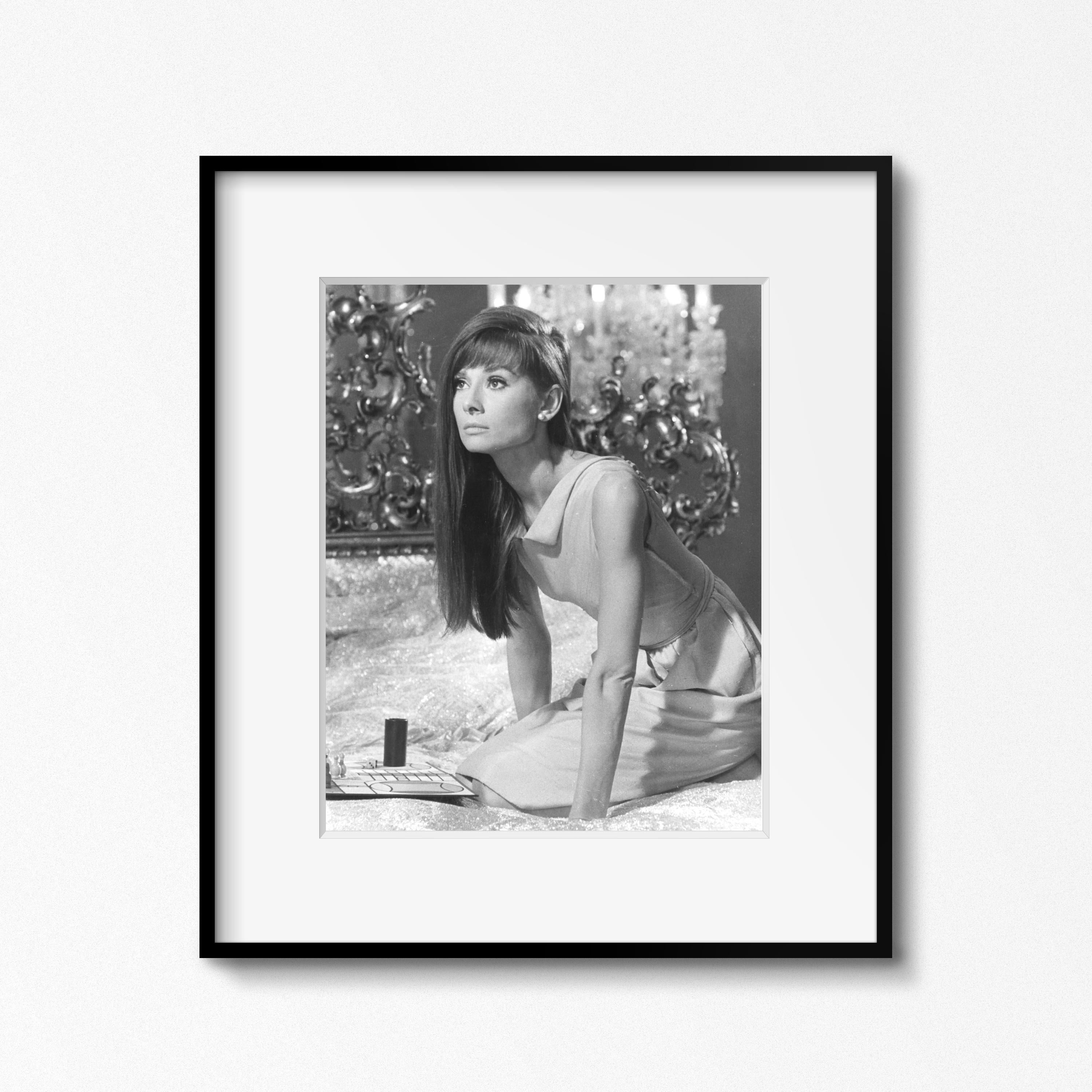 From the Personal collection of Audrey Hepburn

Audrey Hepburn on the set of 'Paris When it Sizzles,' Paris, 1962 by Vincent Rossell
Vintage gelatin silver print
Photographer's credit stamp and numerical notations verso
From the Personal