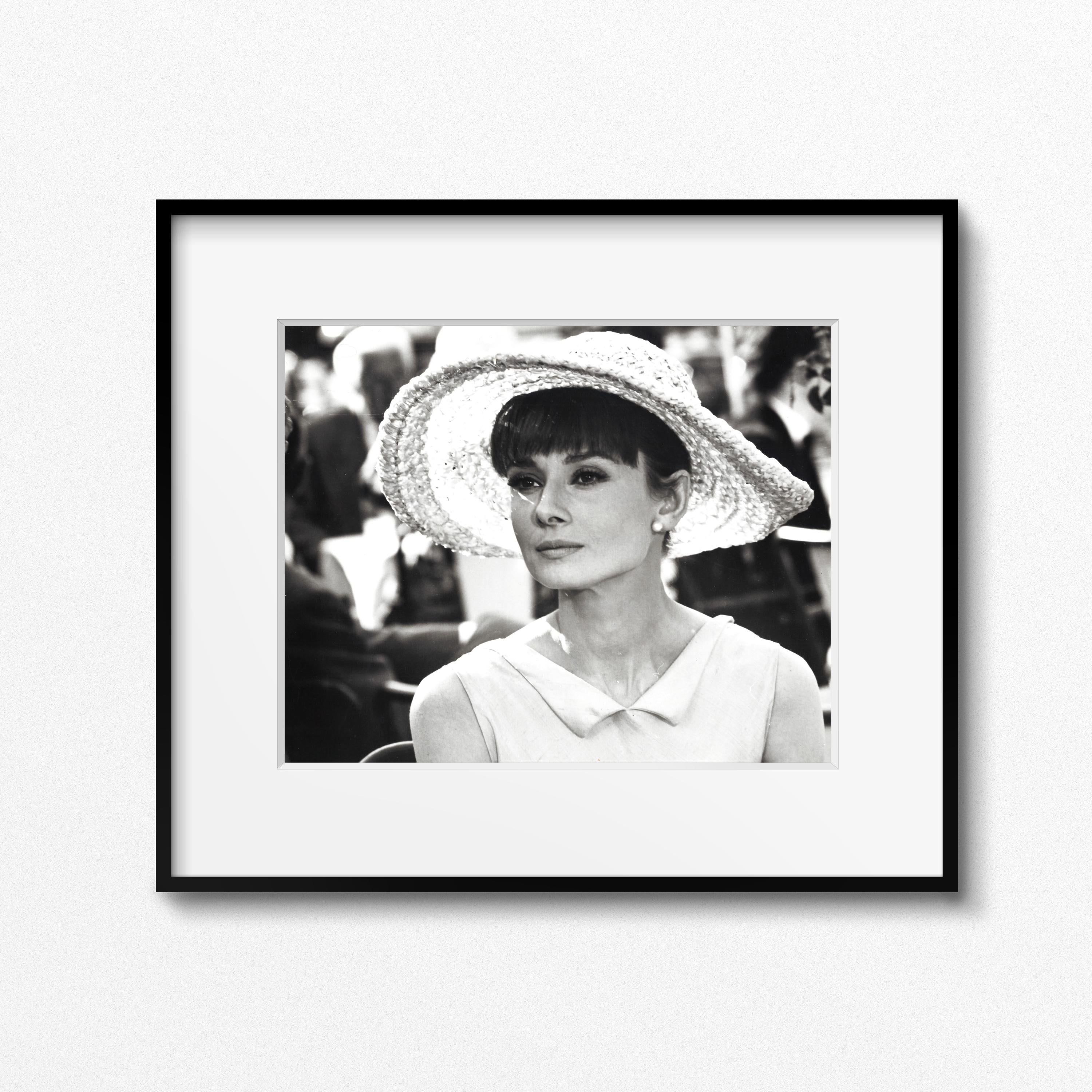 From the personal collection of Audrey Hepburn

Audrey Hepburn on the set of 'Paris When it Sizzles,' Paris, 1962 by Vincent Rossell
Vintage gelatin silver print 
Photographer's credit stamp, Audrey Hepburn collection stamp and numerical
