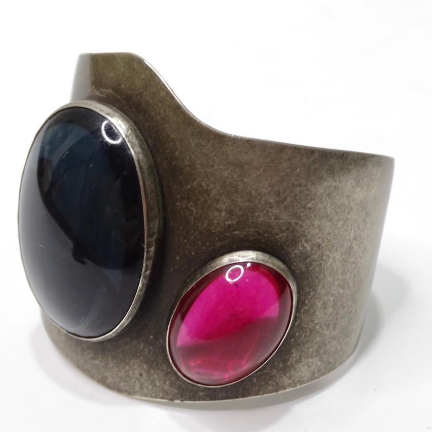 This Audrey Schenk silver gemstone arm cuff is such a fun piece to spice up any outfit! Vintage silver cuff style bracelet is adorned in a large black onyx and a smaller hot pink synthetic sapphire to create this incredible statement piece of