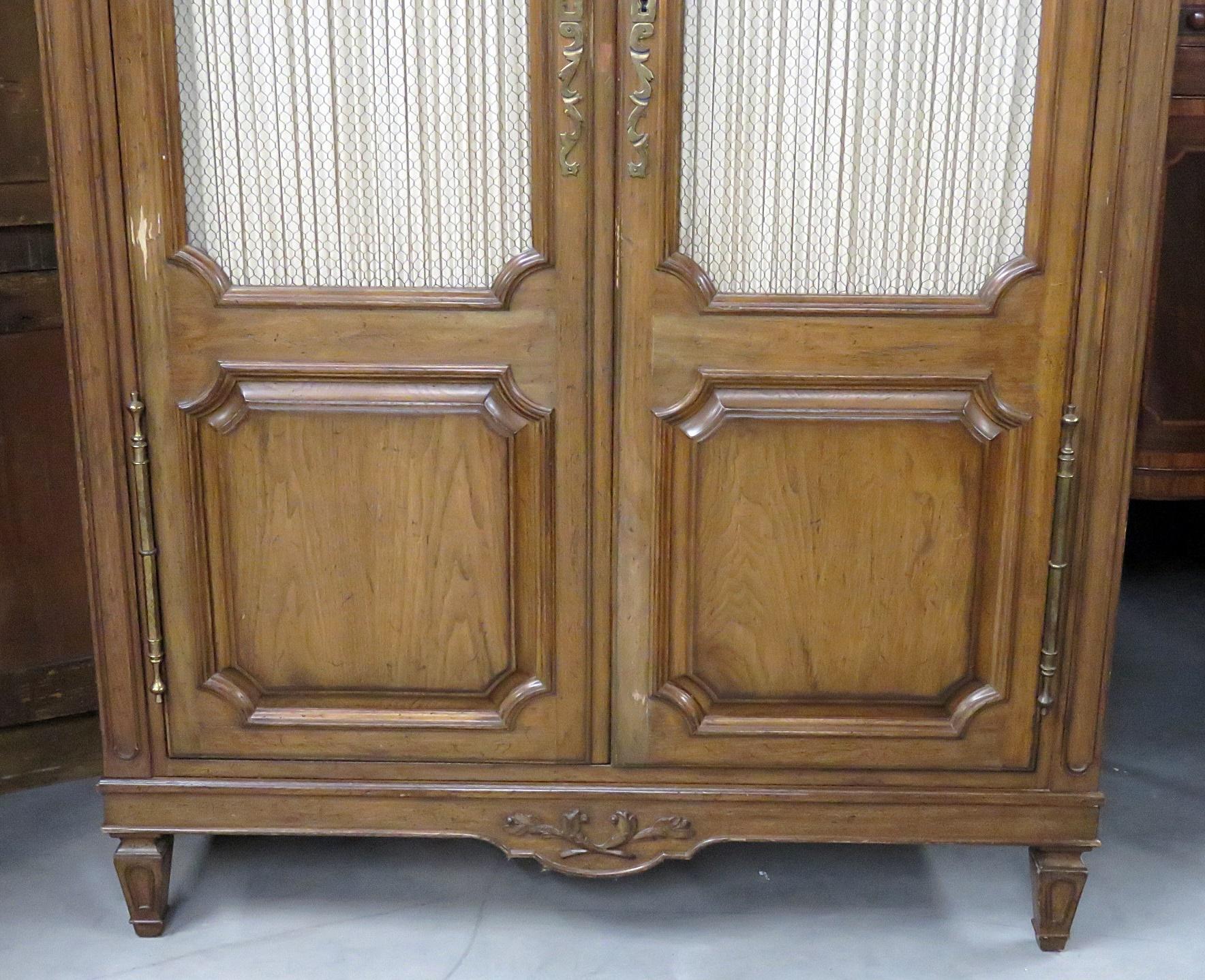 Auffray Country French armoire with 1 shelf, 8 storage cubes, and 6 drawers.
