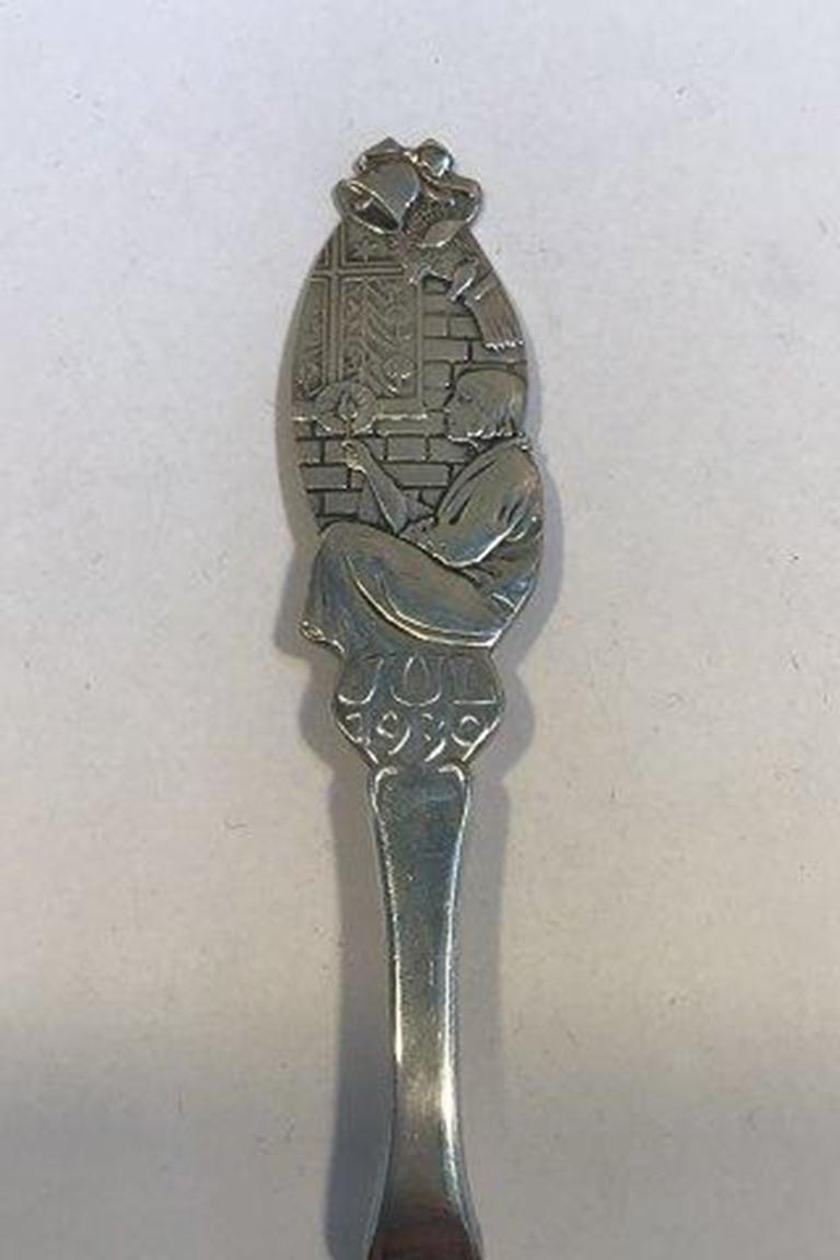 Aug. Thomsen silver Christmas spoon 1930 

Measures 18 cm(7 3/32 in).
   