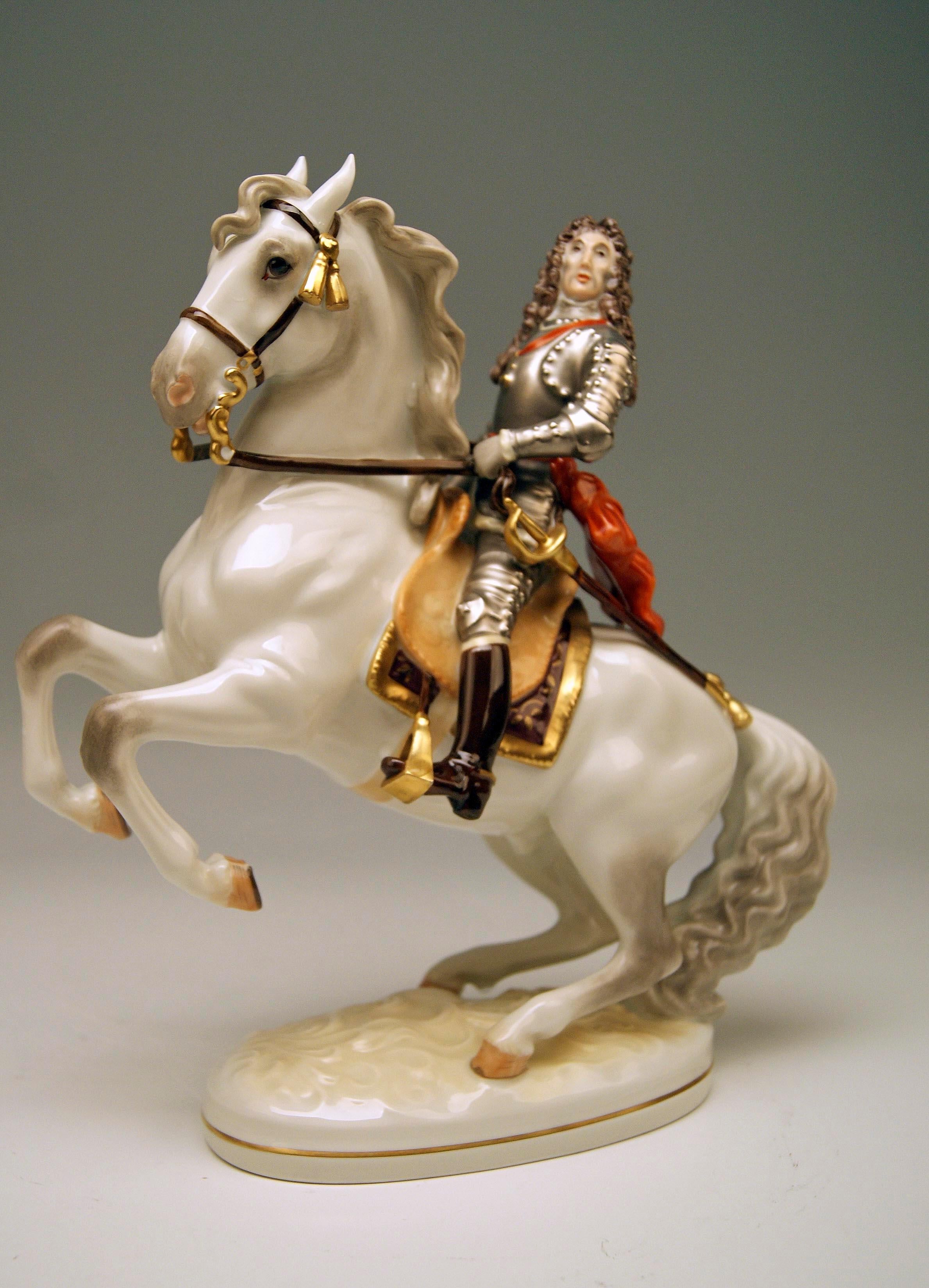 Augarten Vienna Figurine:
The Famous Viennese Commander Prince Eugene of Savoy on Horse
He is shown in his armour and is wearing a typical Baroque long-haired wig. In his right hand he is holding the sign of the General Field Marshal. The horse is