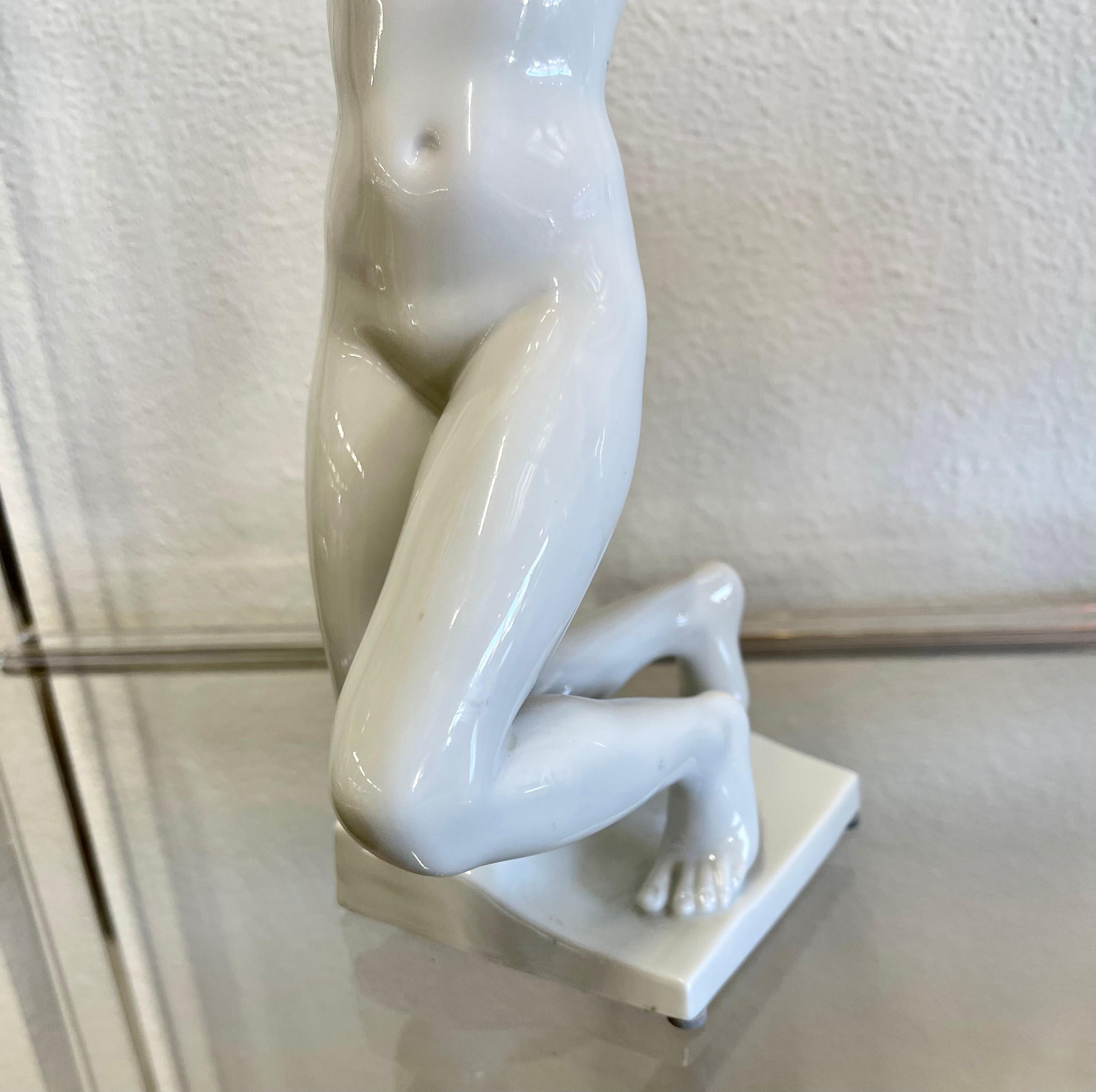 Lovely porcelain figurine of a nude by the Augarten Porcelain Manufacture of Vienna, Austria. Marked with the company logo on the base. In excellent condition. Some museum wax and sticky substance on base. Measure: Approx 11 inches tall.