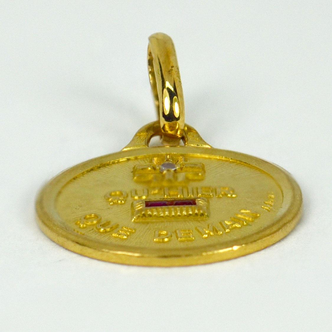 A French 18 karat (18K) yellow gold, diamond and ruby love charm pendant with a rebus spelling out 