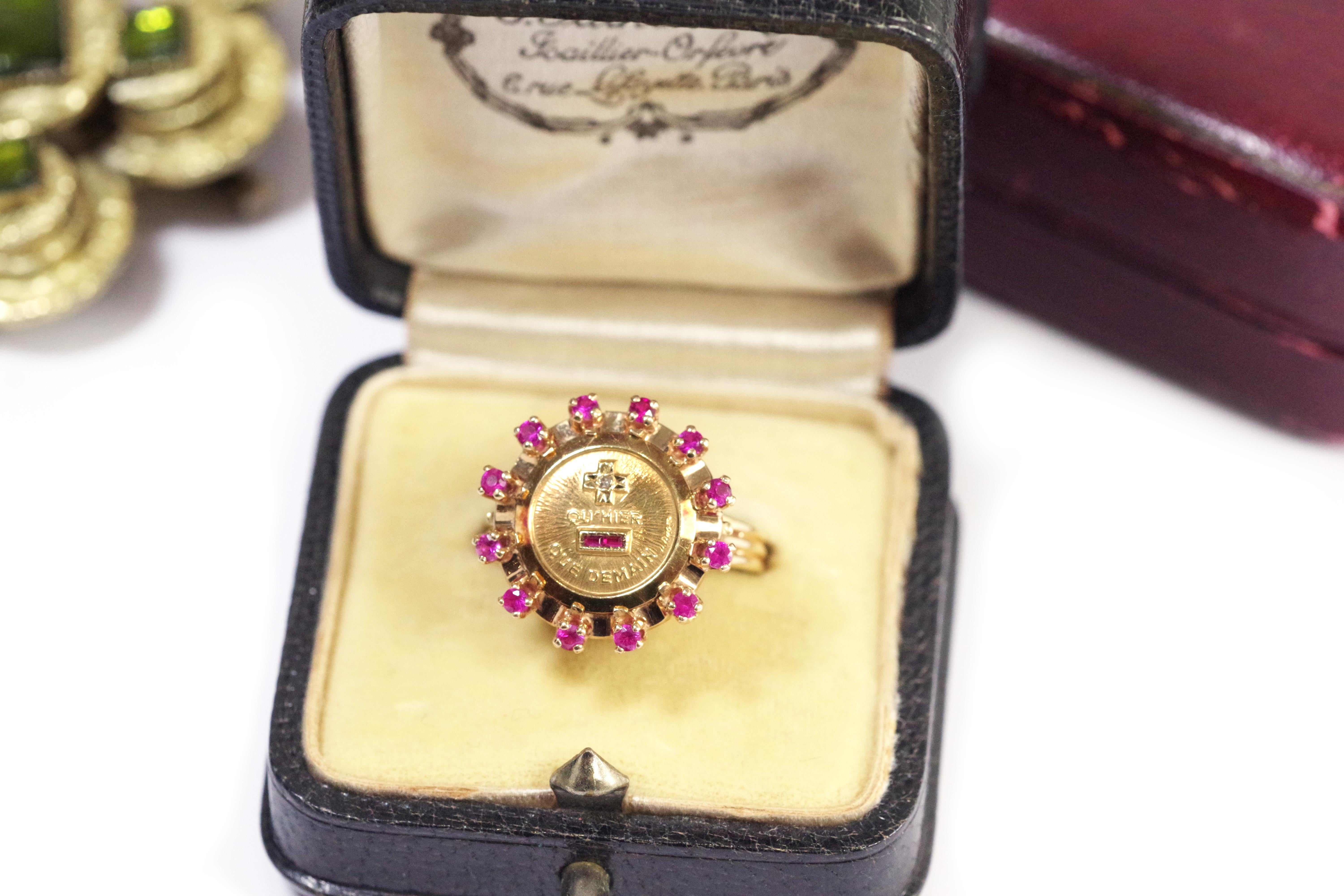 Round Cut Augis halo ruby ring in 18k gold, more than yesterday less than tomorrow For Sale