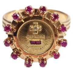 Vintage Augis halo ruby ring in 18k gold, more than yesterday less than tomorrow