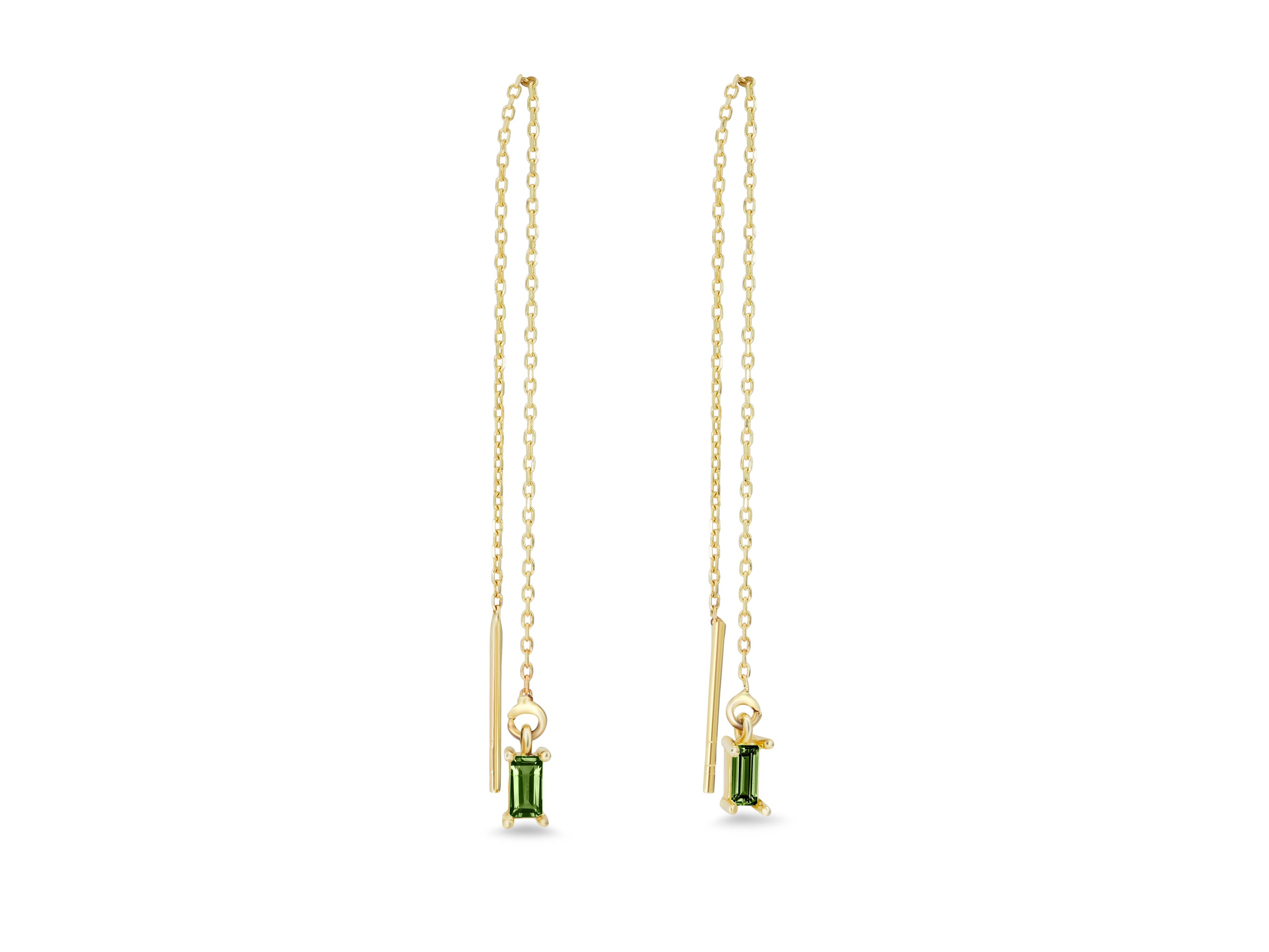 14k solid gold drop earrings with peridots. 
Natural peridot solid gold earrings. Chain earrings. Delicate Solid Gold chain Earrings.

Metal: 14k gold
Weight: 0.8-0.9 g.
Size: 6.5-6.8 sm.

Central stones: Natural peridot 2 pieces
Cut: