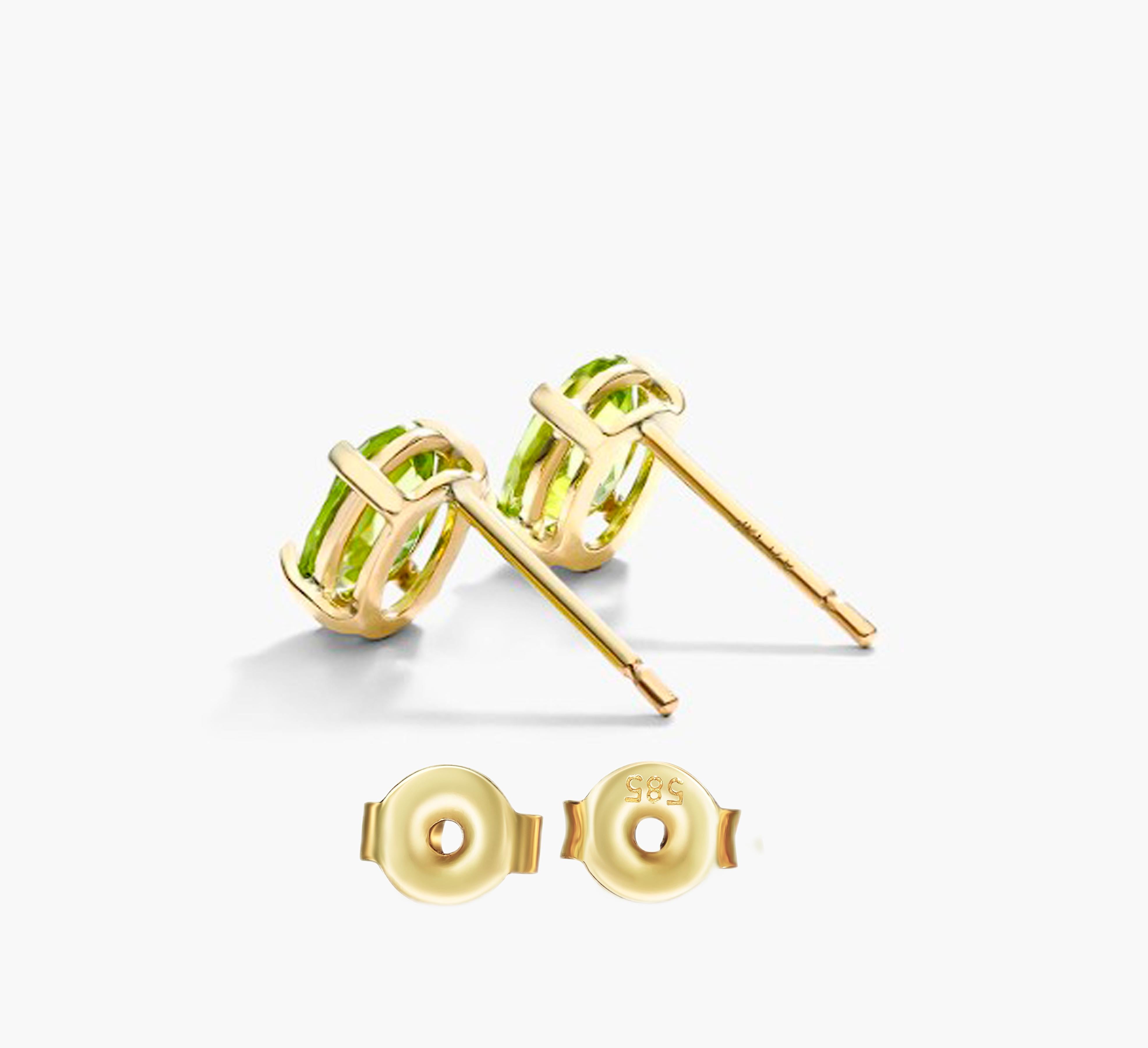 Oval Cut August birthstone peridot 14k gold earrings studs For Sale
