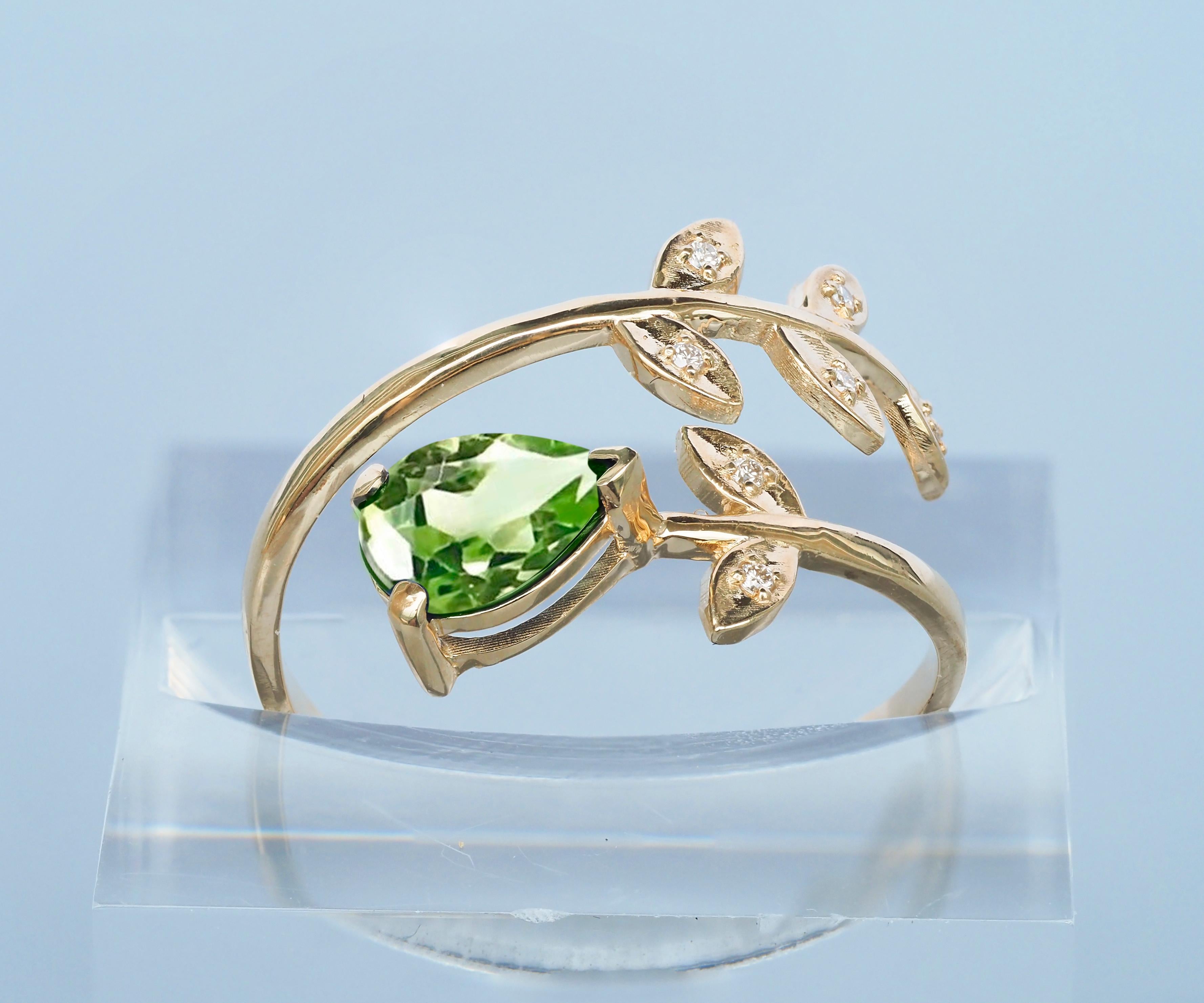 Pear Cut August birthstone peridot 14k gold ring. For Sale